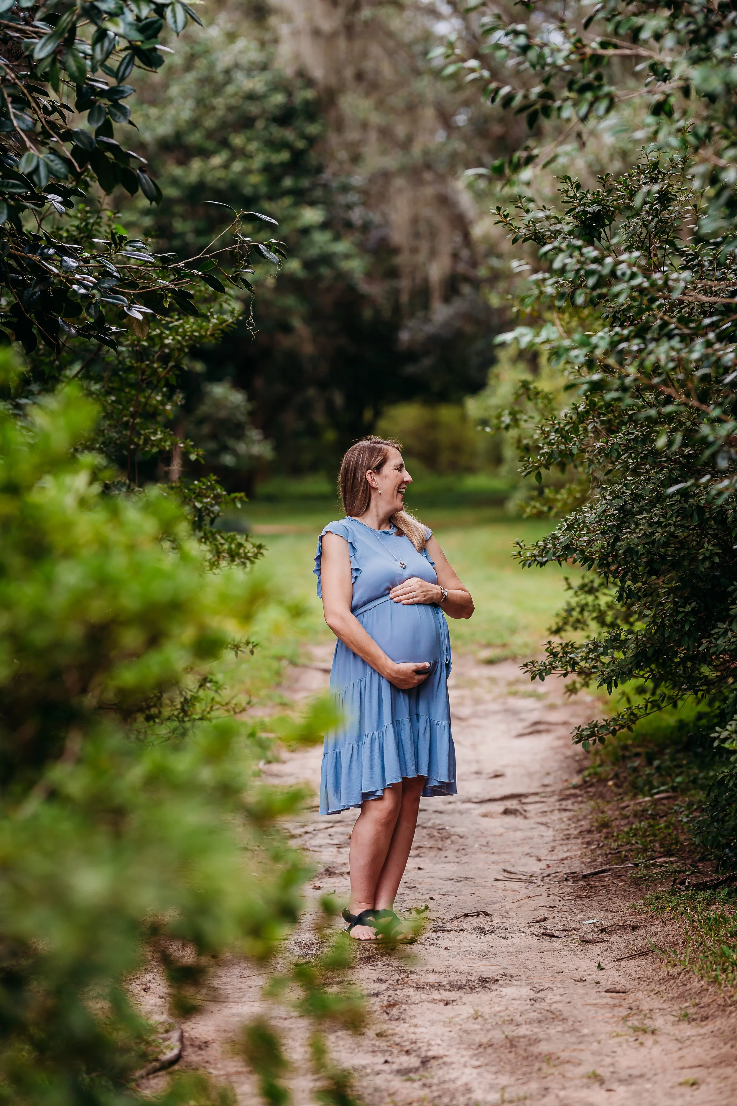 Outdoor natural light sunset maternity photography session at Alfred B. Maclay Gardens State Park in Tallahassee, Florida