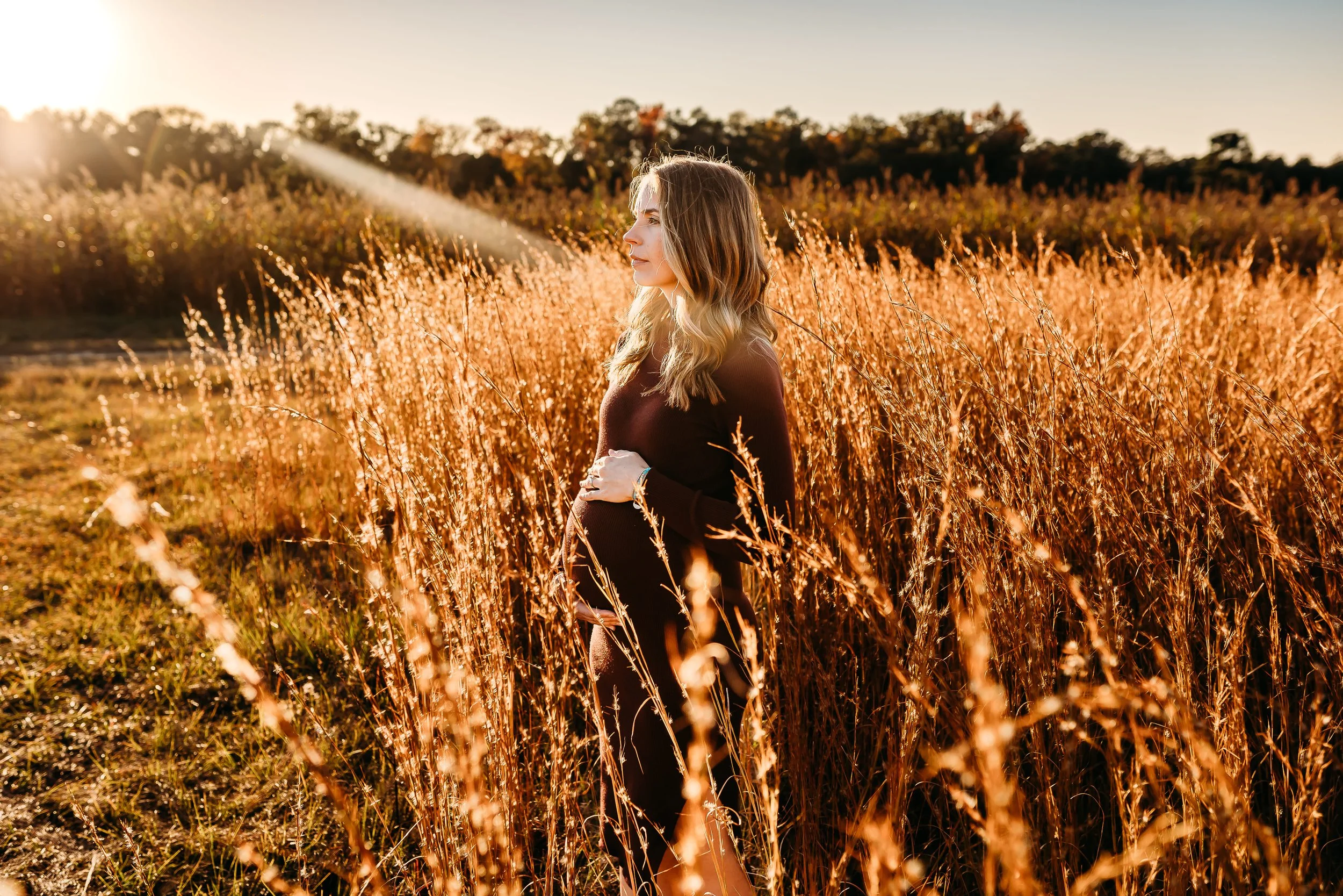 Outdoor natural light sunset maternity photography session at Spring Hill Tree Farm in Bainbridge, Georgia