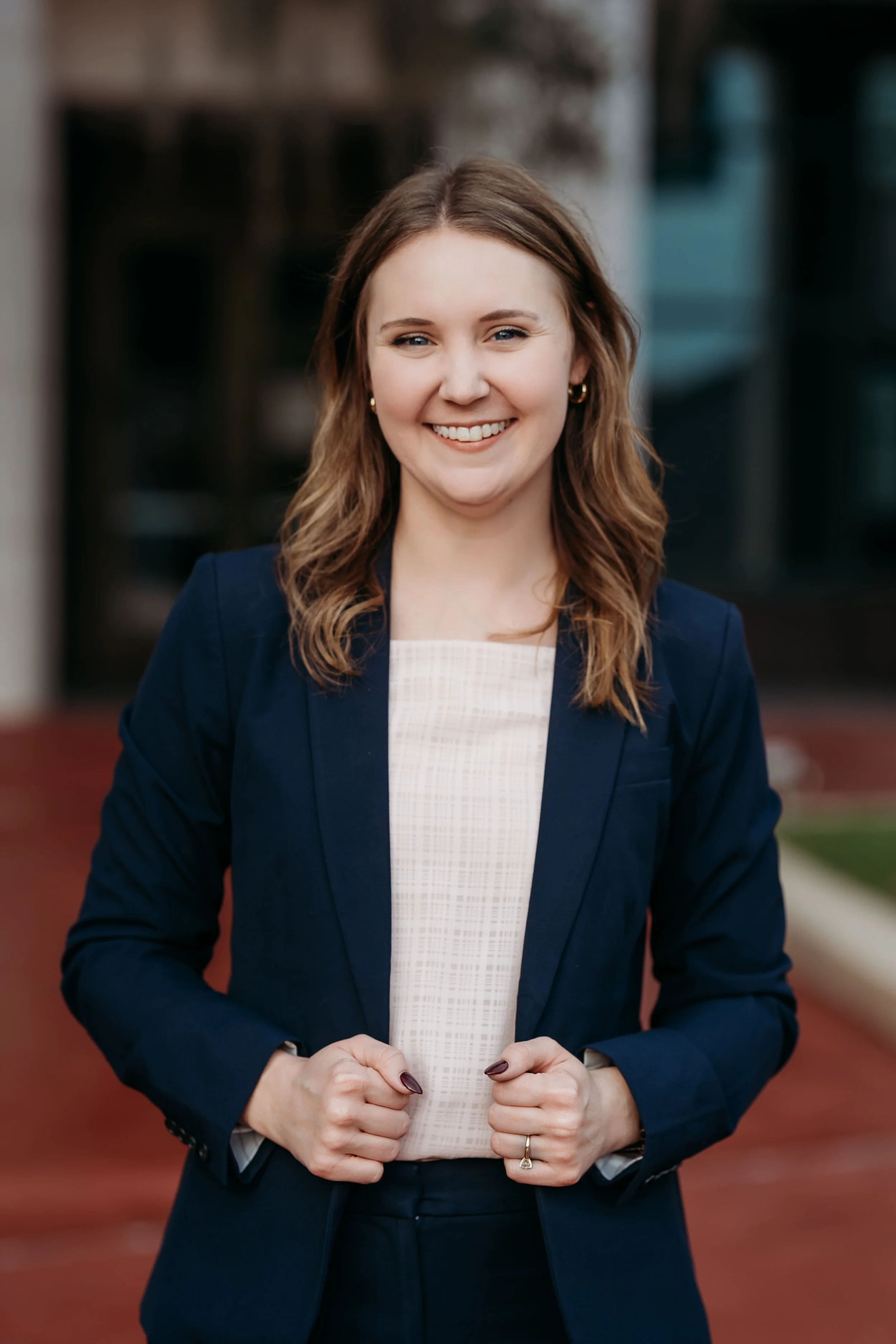 Outdoor professional headshot outside the Leon County Courthouse with natural light in Tallahassee, Florida