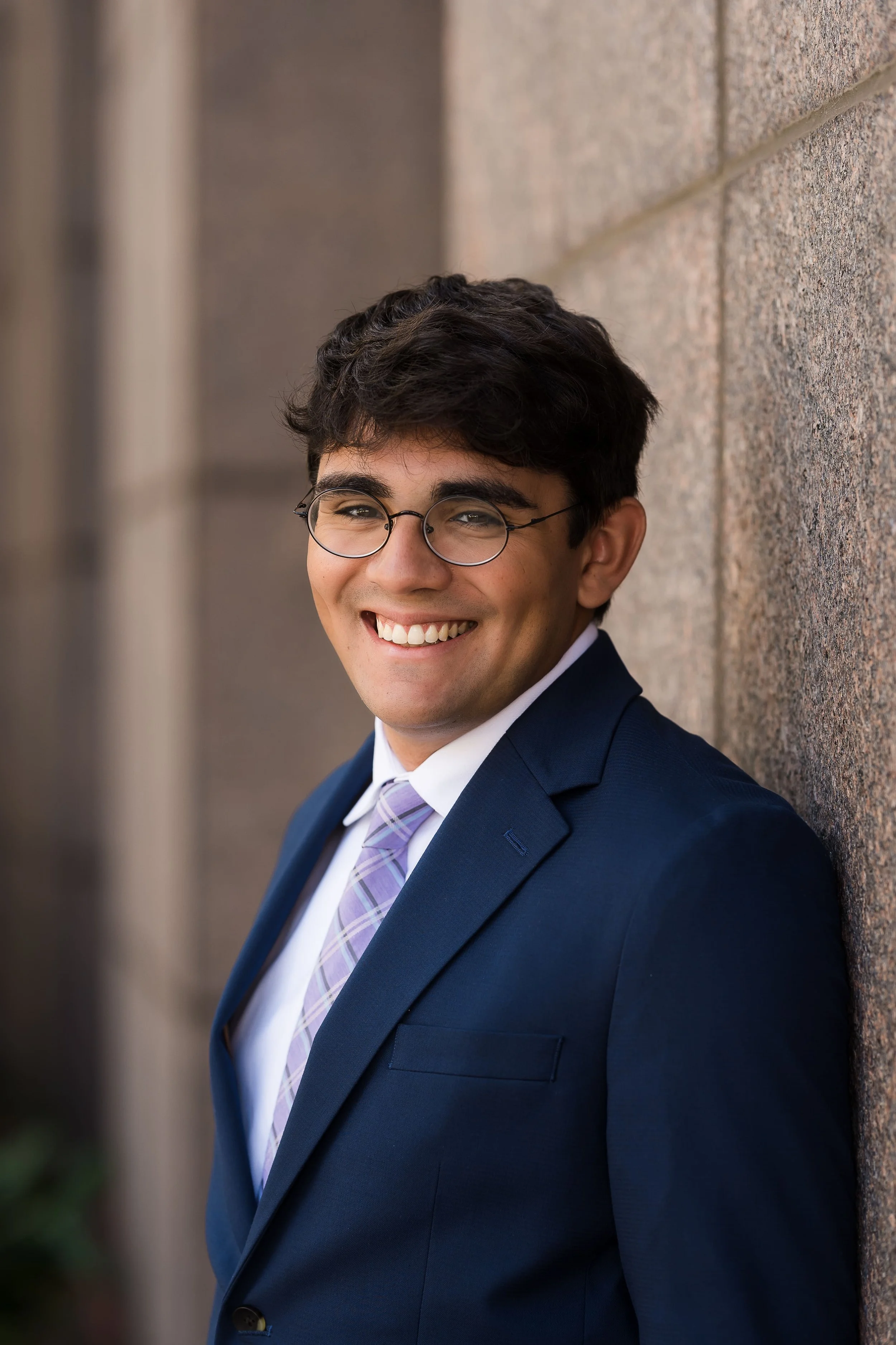 Outdoor professional headshot outside the Leon County Courthouse with natural light in Tallahassee, Florida