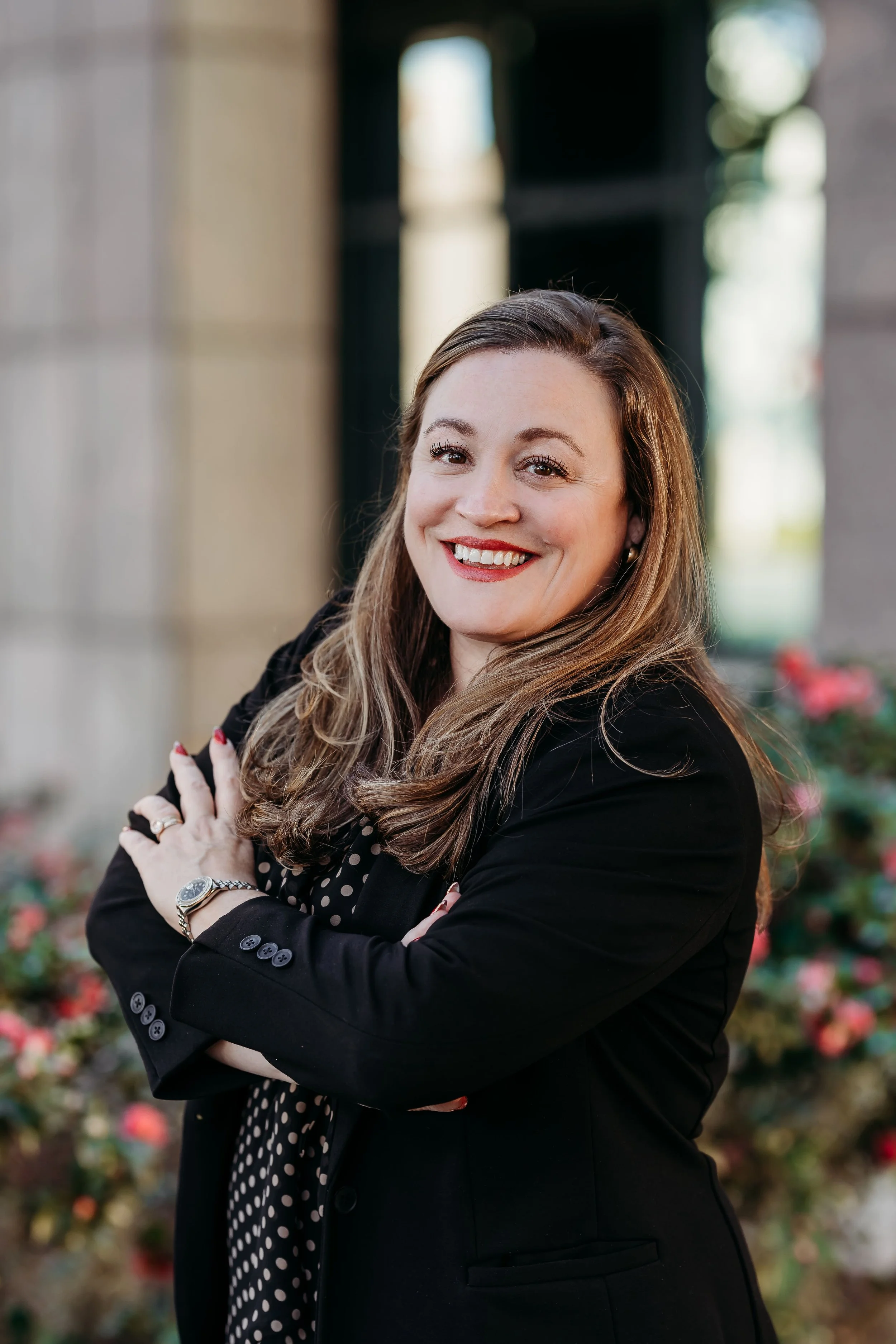 Outdoor professional headshot outside the Leon County Courthouse with natural light in Tallahassee, Florida