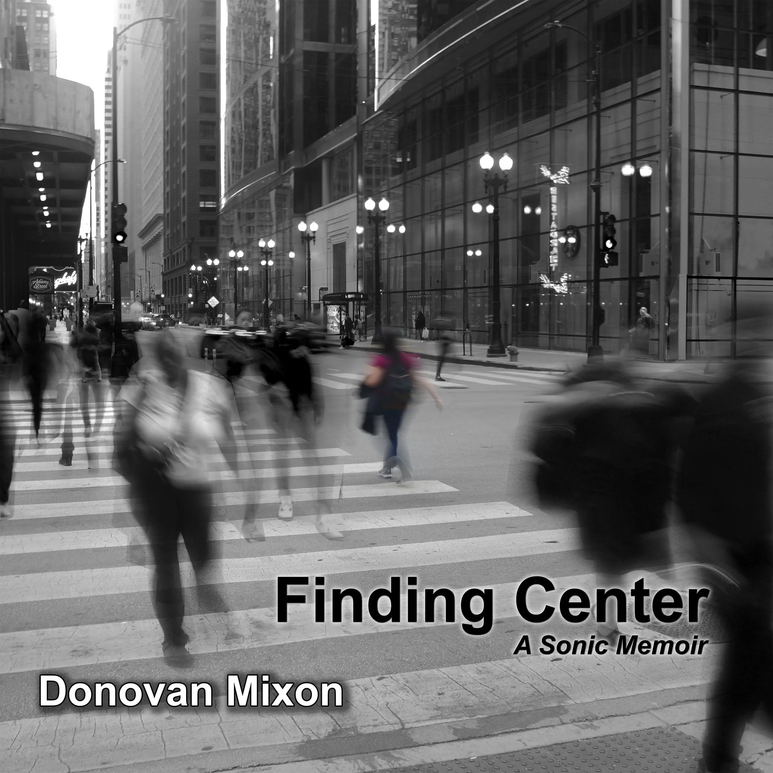 Black and white photo of a busy city crosswalk with blurred pedestrians and cars, tall modern buildings, and street lamps. The title 'Finding Center: A Sonic Memoir' by Donovan Mixon is overlaid at the bottom.