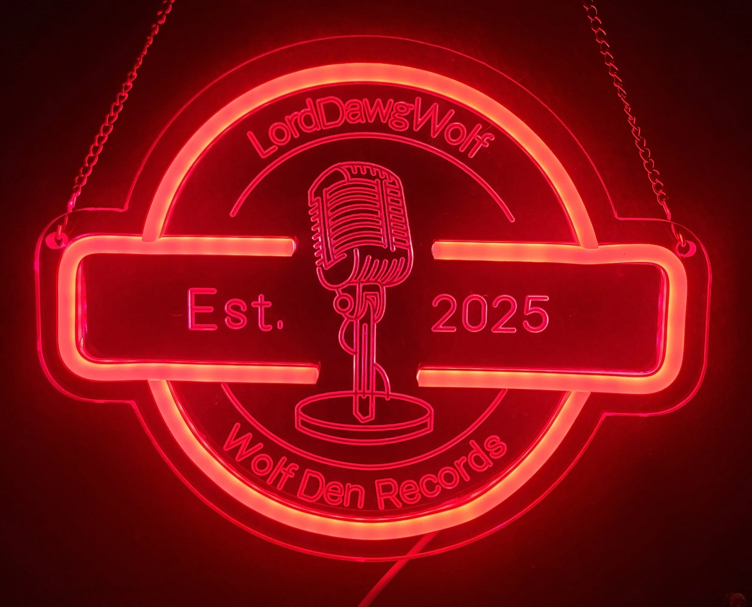 Neon sign with red outlines displaying the text 'Lord Daws Worts,' an image of a vintage microphone, the establishment year 2025, and words 'World Deaf Records'.