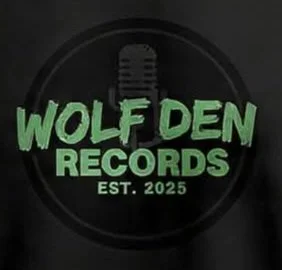 Logo for Wolf Den Records featuring a microphone and the text 'Wolf Den Records Est. 2025' in green and black.