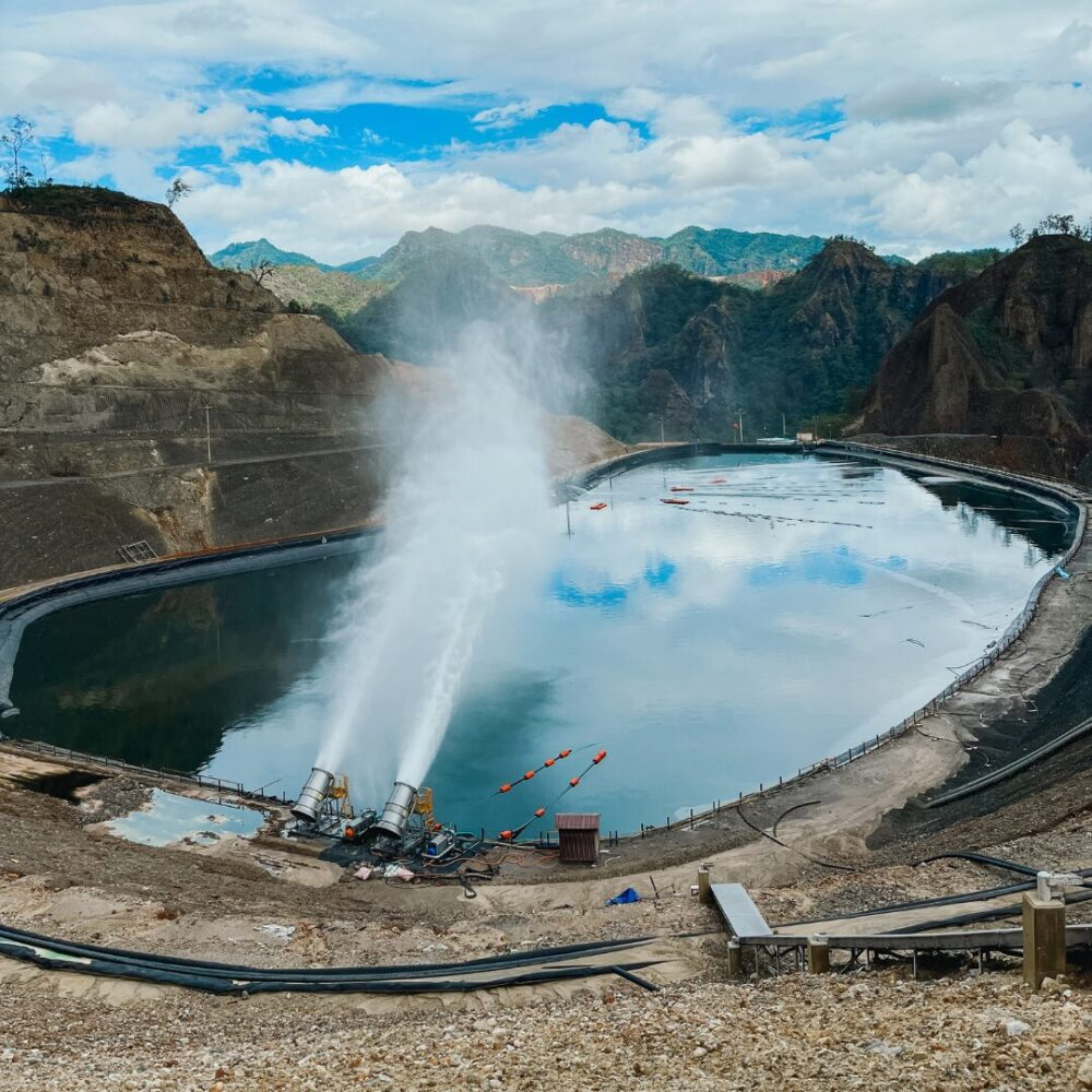 Water evaporators reducing water levels of a waste pond in an industrial facility providing industry water management