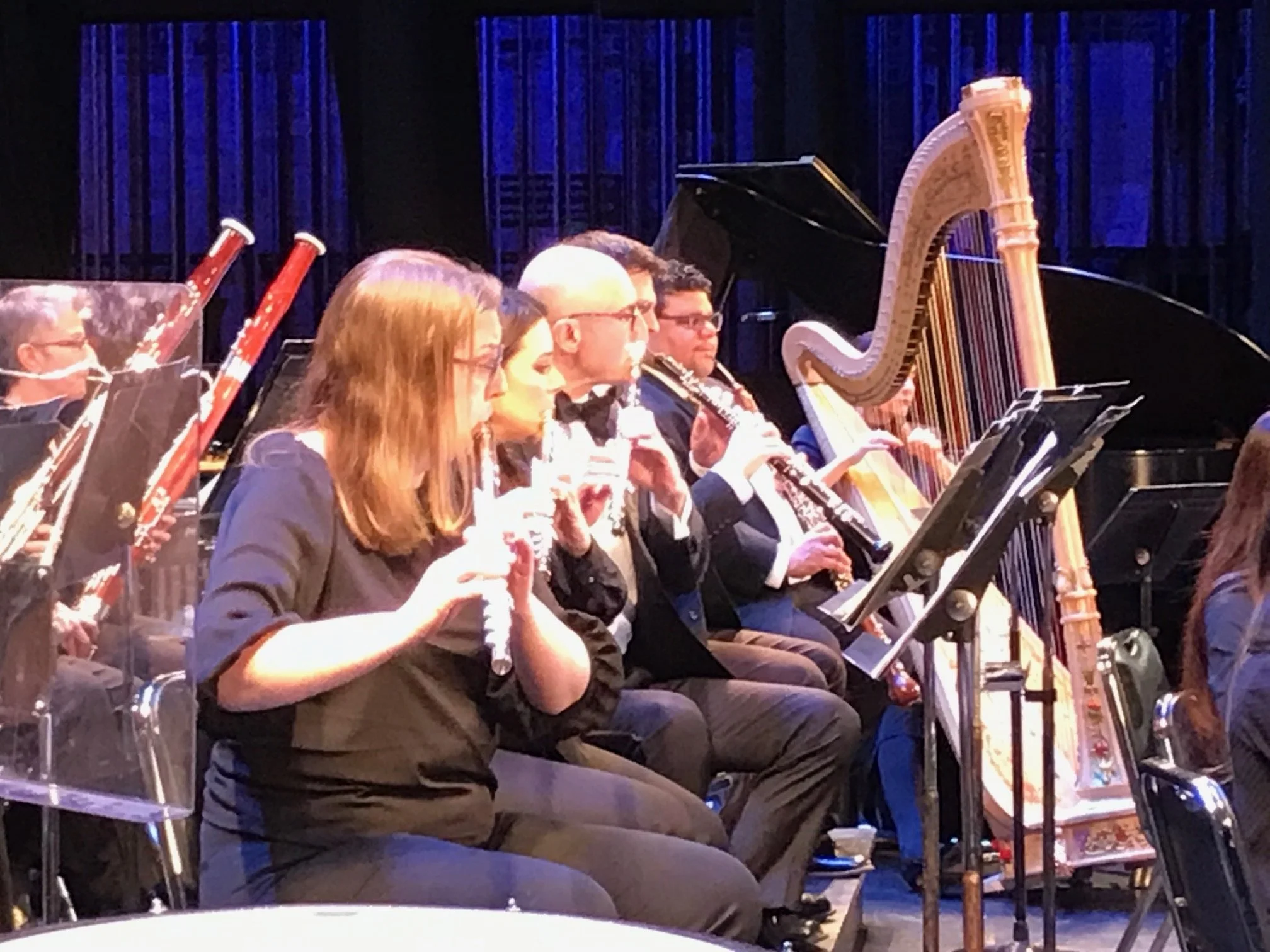 GBS flutists and harpist performing in concert