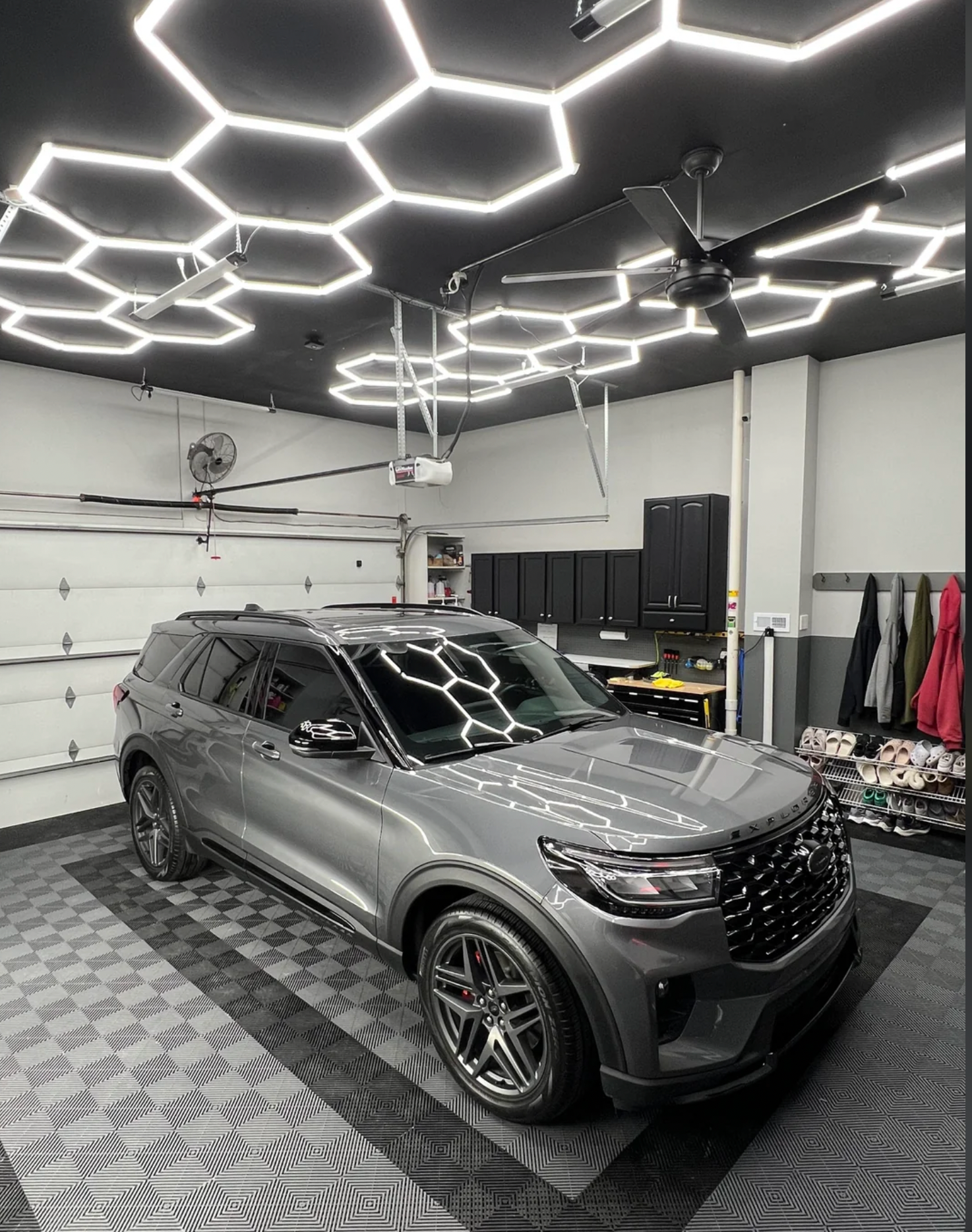 Ceiling Lighting, Epoxy Floors with Swiss Trax Overlay and Custom Cabinets for a full renovation