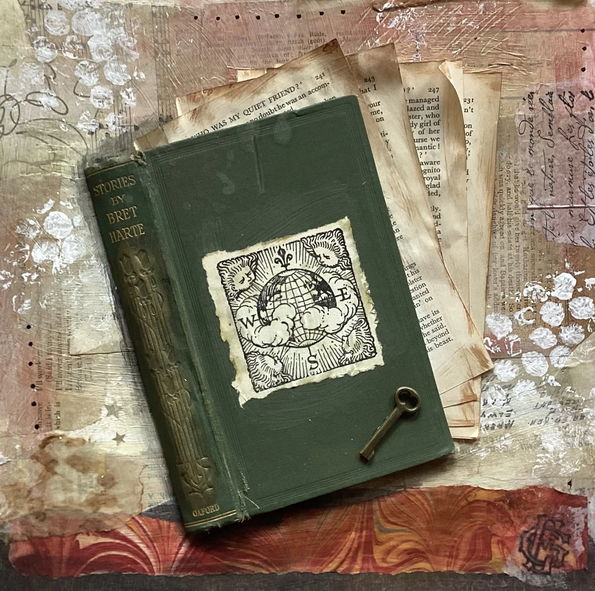  Bookish small #2 
 
12” x 12”
 
$110.00
 
Collage of vintage papers, old book spines and antique key