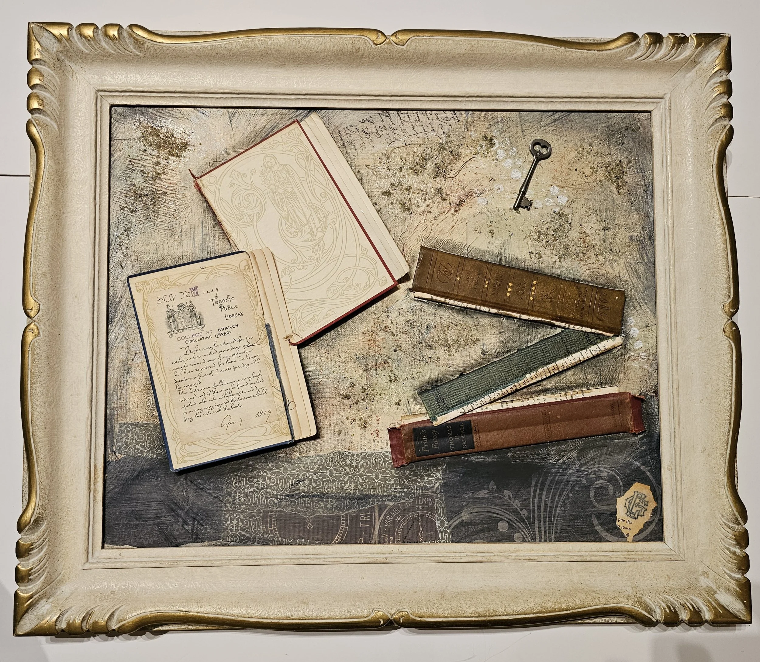  Bookish #12 
 
With Frame. 21” x 25”. Artwork only. 16”x 20”
 
$470.00
 
Collage of antique book covers and vintage papers on canvas.