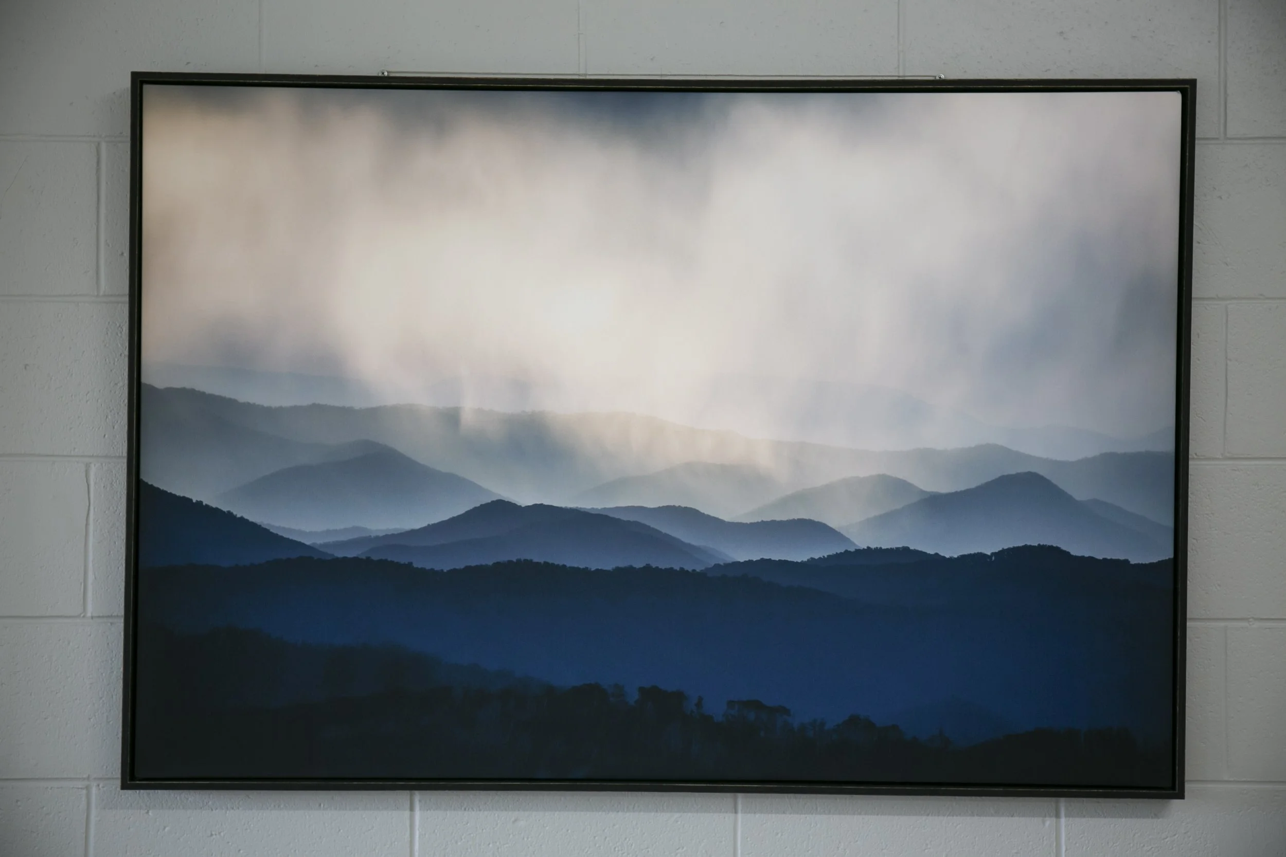 Photograph of a misty mountain rainge