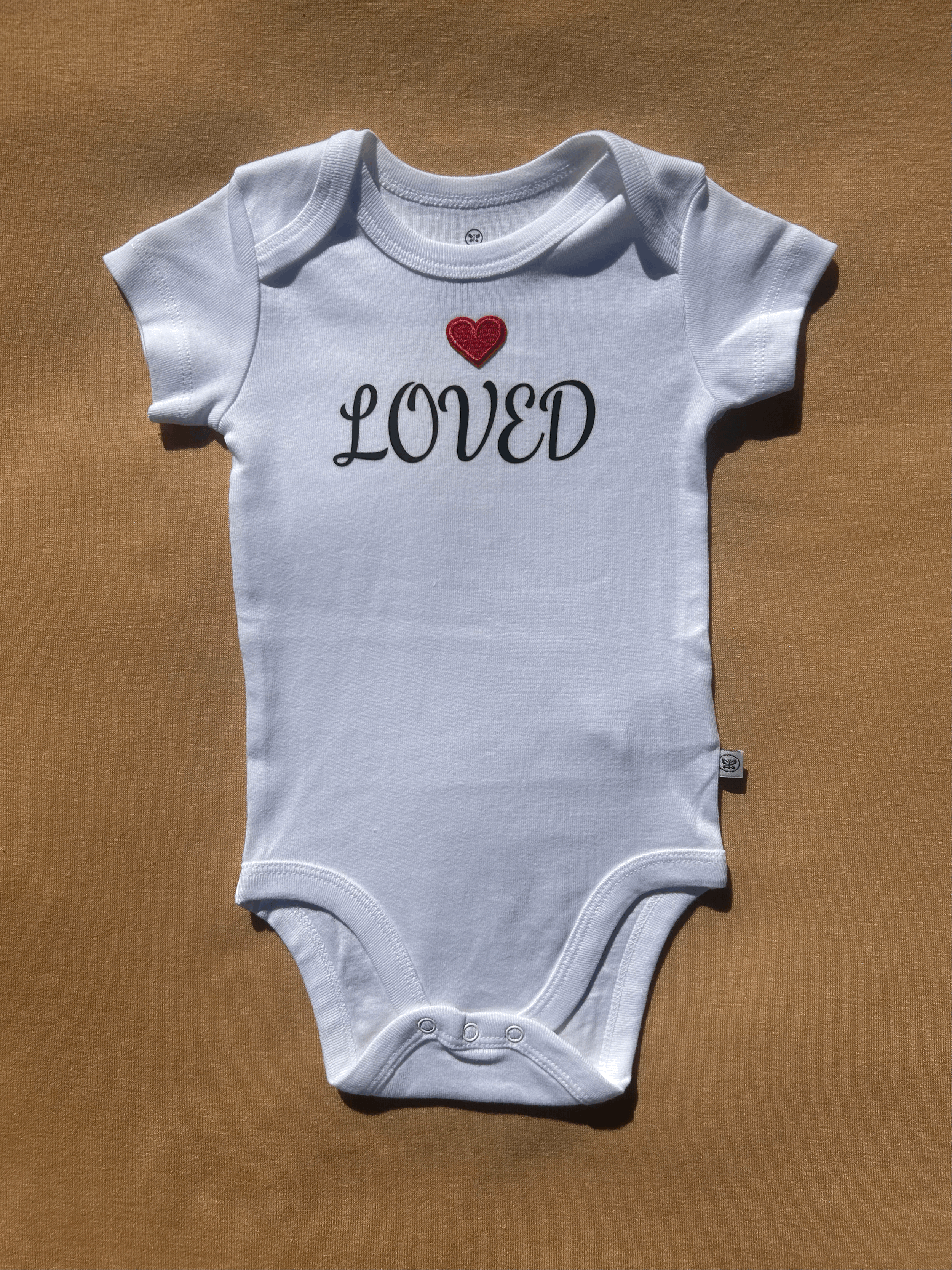 Organic Cotton 'LOVED' Onesie with Heart Patch size 3 to 6 months