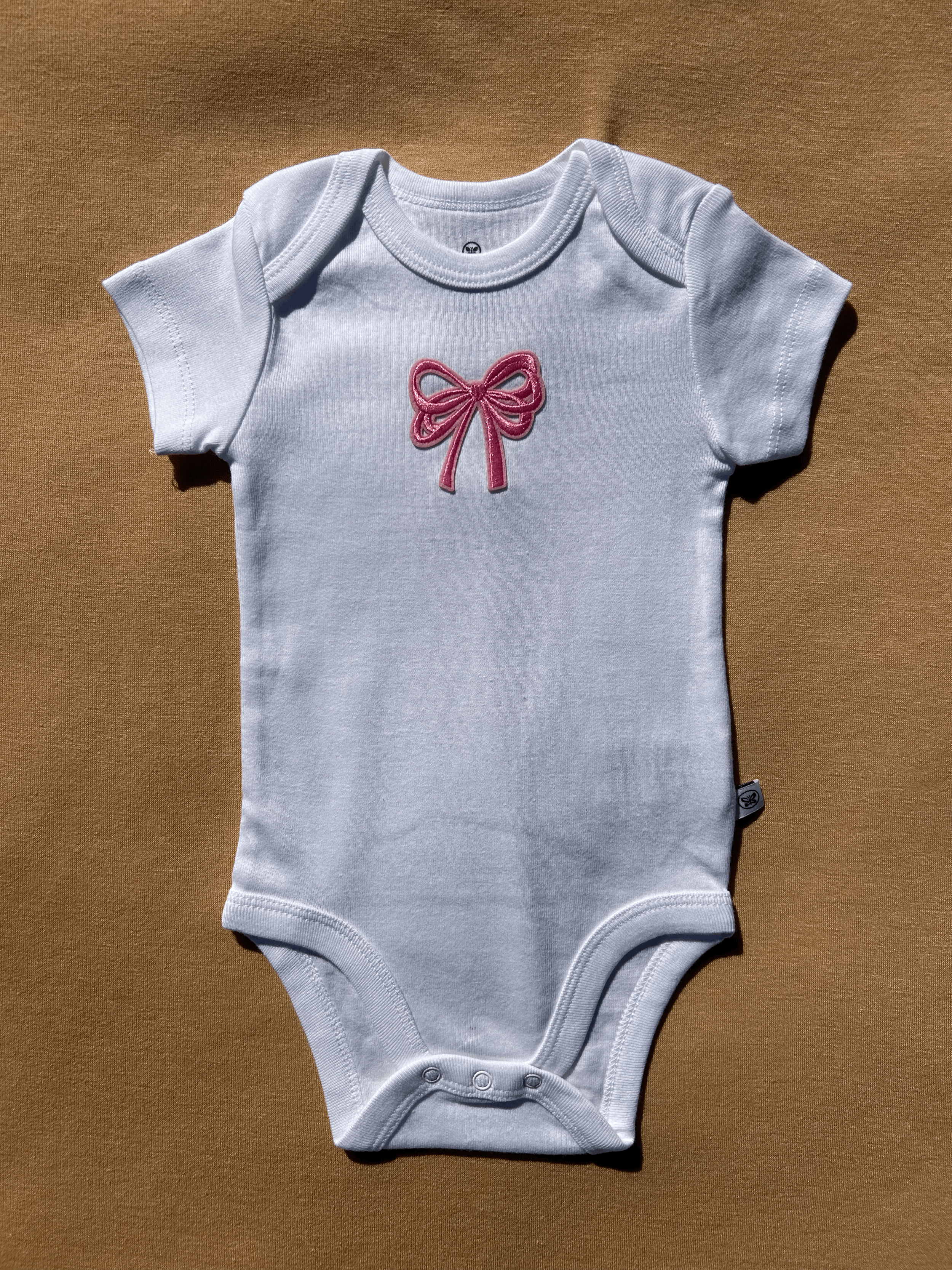 Organic Cotton Onesie with Pink Bow Patch size 3 to 6 months