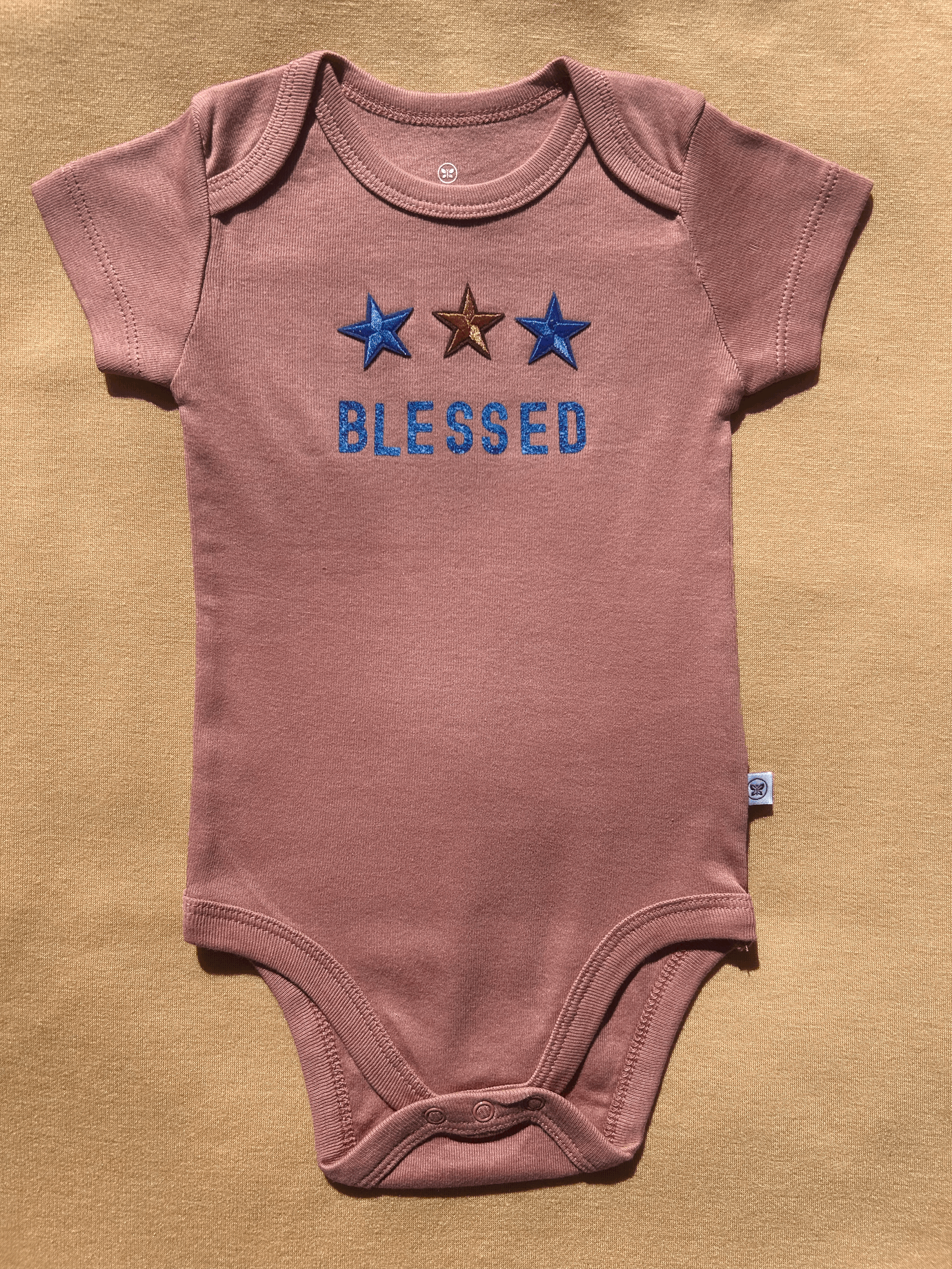 Organic Starry 'Blessed' Cotton Onesie - Pastel Brown size 3 to 6 months