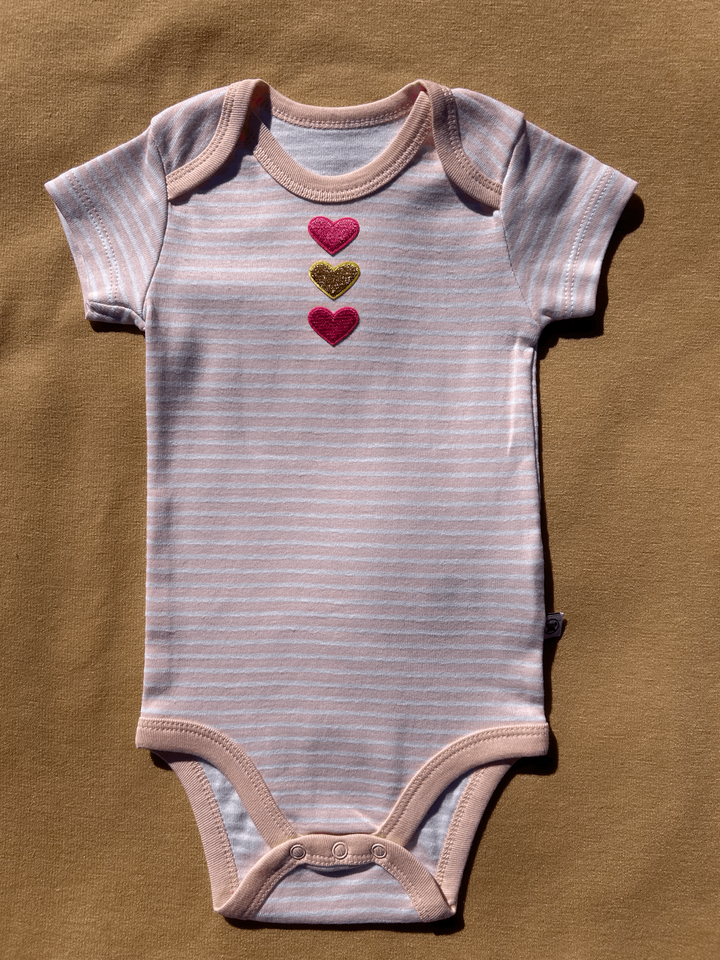 Charming Pink Striped Onesie with Heart Patches size 3 to 6 months