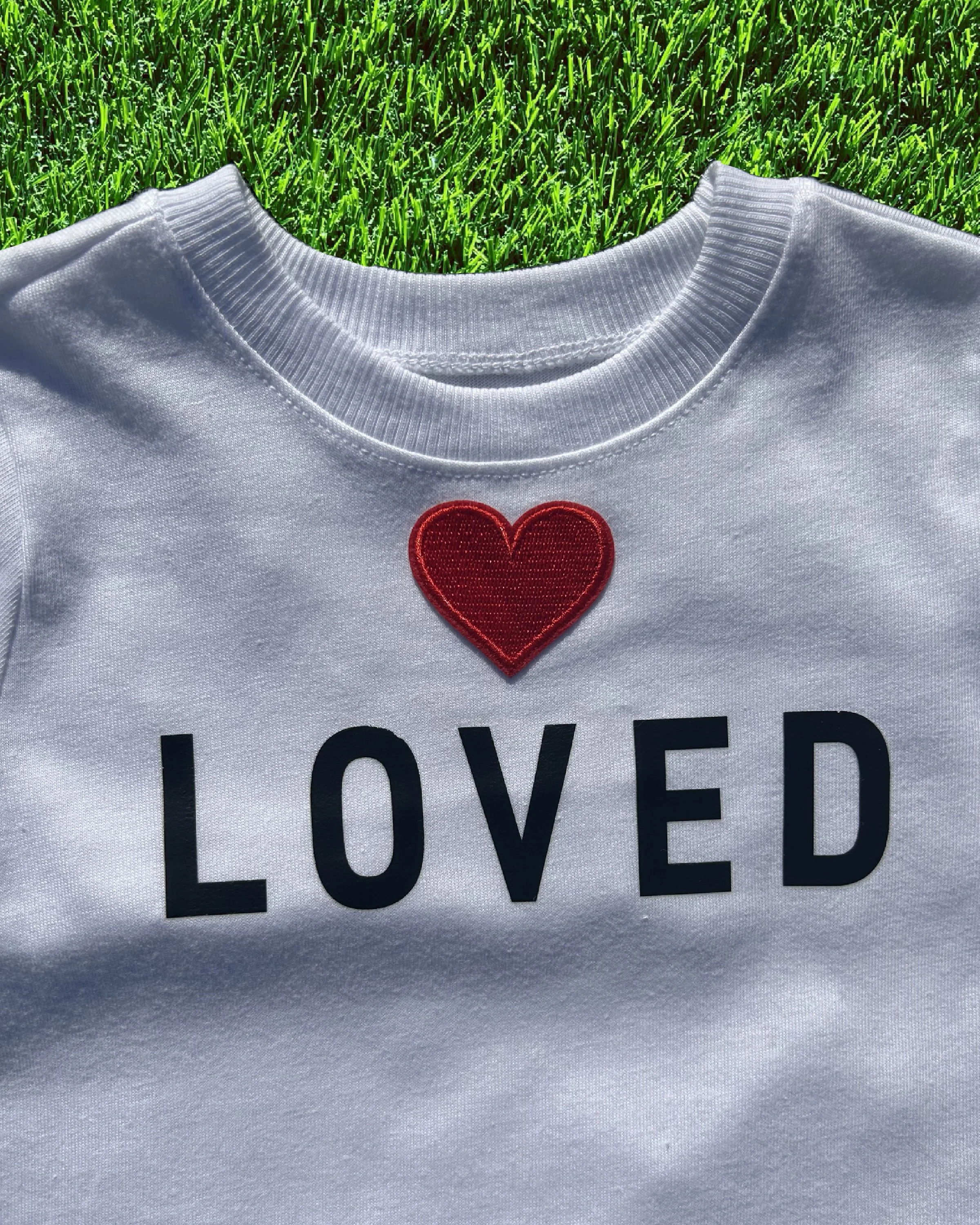 "Loved" in Bold letters (4t)