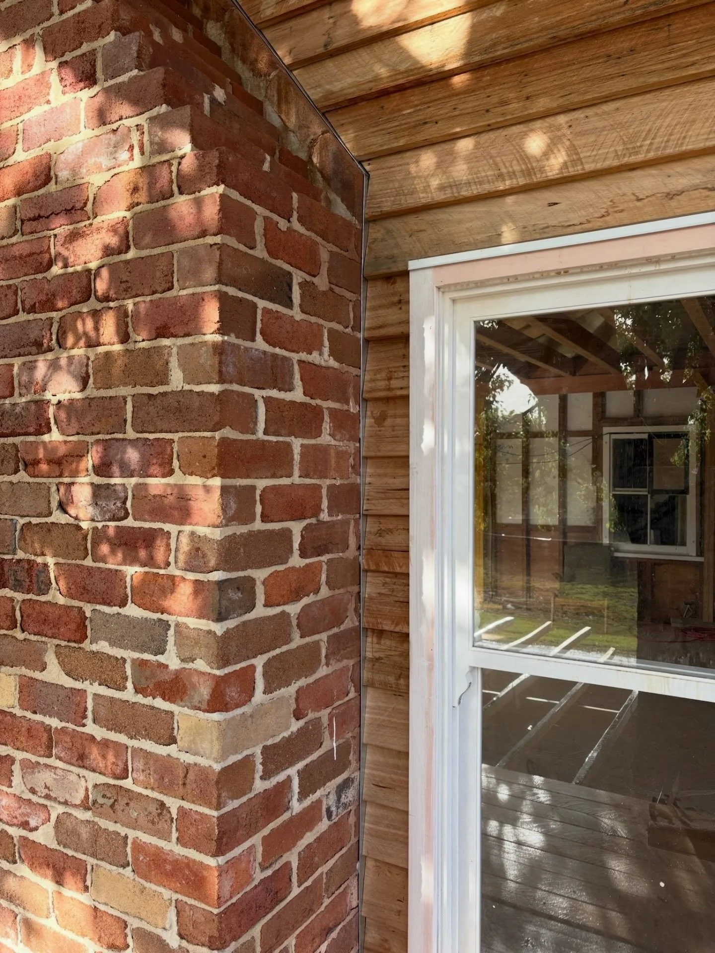 External details at Nevada.

Reclaimed brick, rough sawn weather boards and timber windows.
