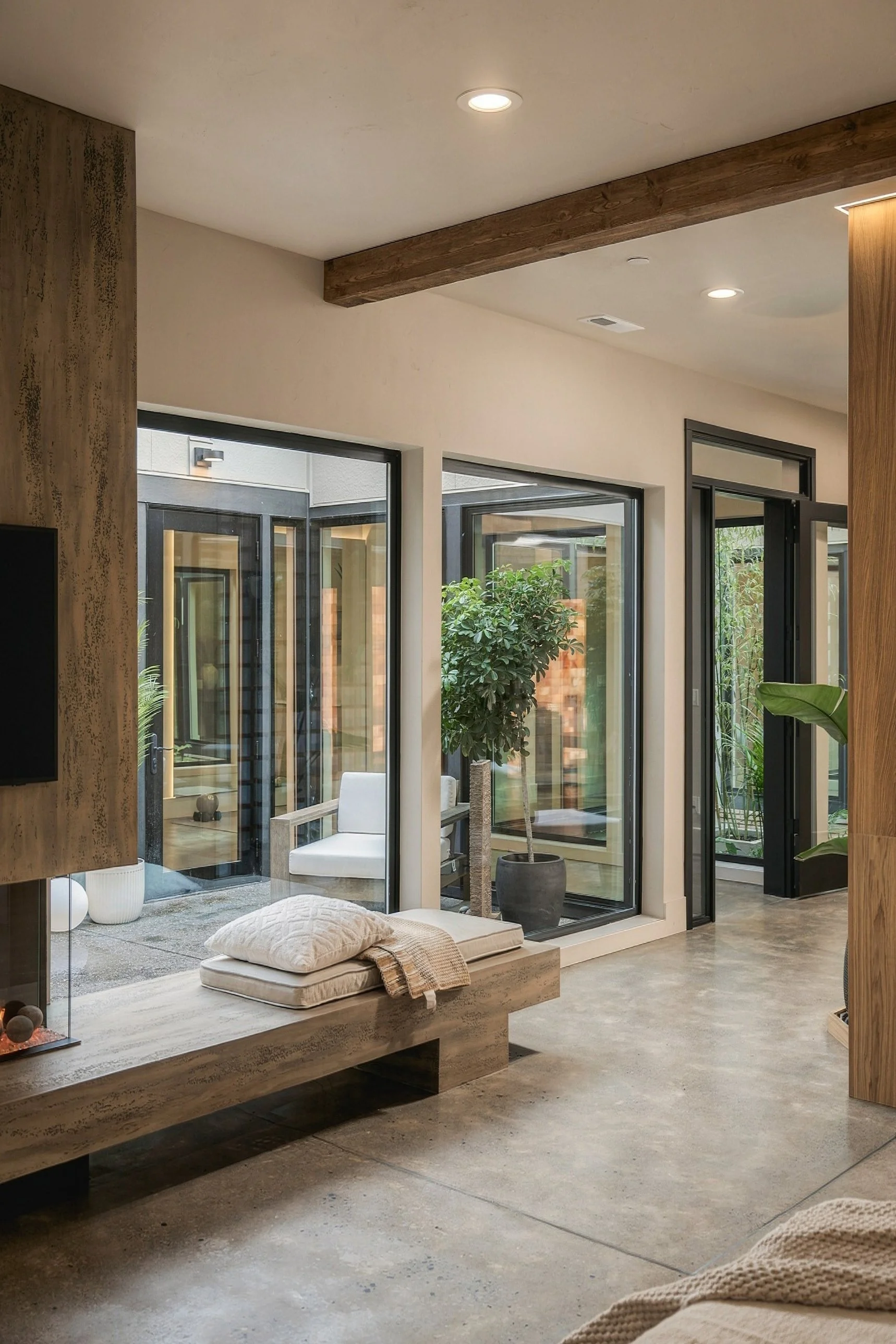 Bedroom sitting area looking onto a private courtyard