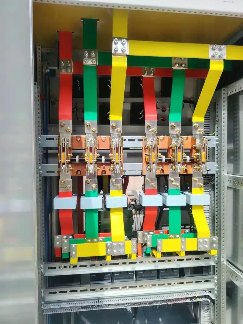 A detailed LV/MV switchgear busbar system featuring insulated copper busbars and precision-mounted connectors. Designed for high-capacity power distribution, reliable conductivity, and modular switchgear assemblies.