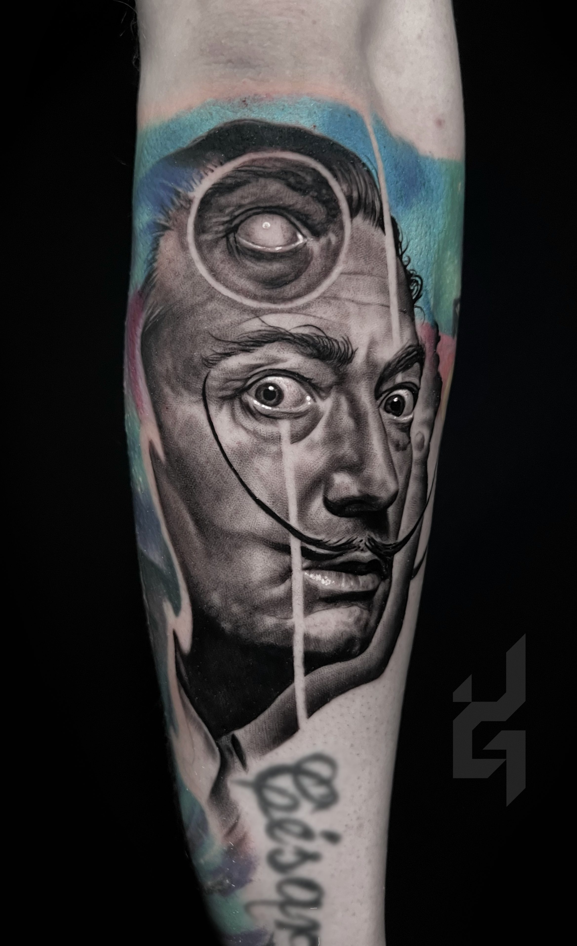 Innovative realistic black and grey portrait tattoo Salvador Dali with graphic design integration In Los Angeles Area, at Outer Limits tattoo shop. by Jhon Gutti