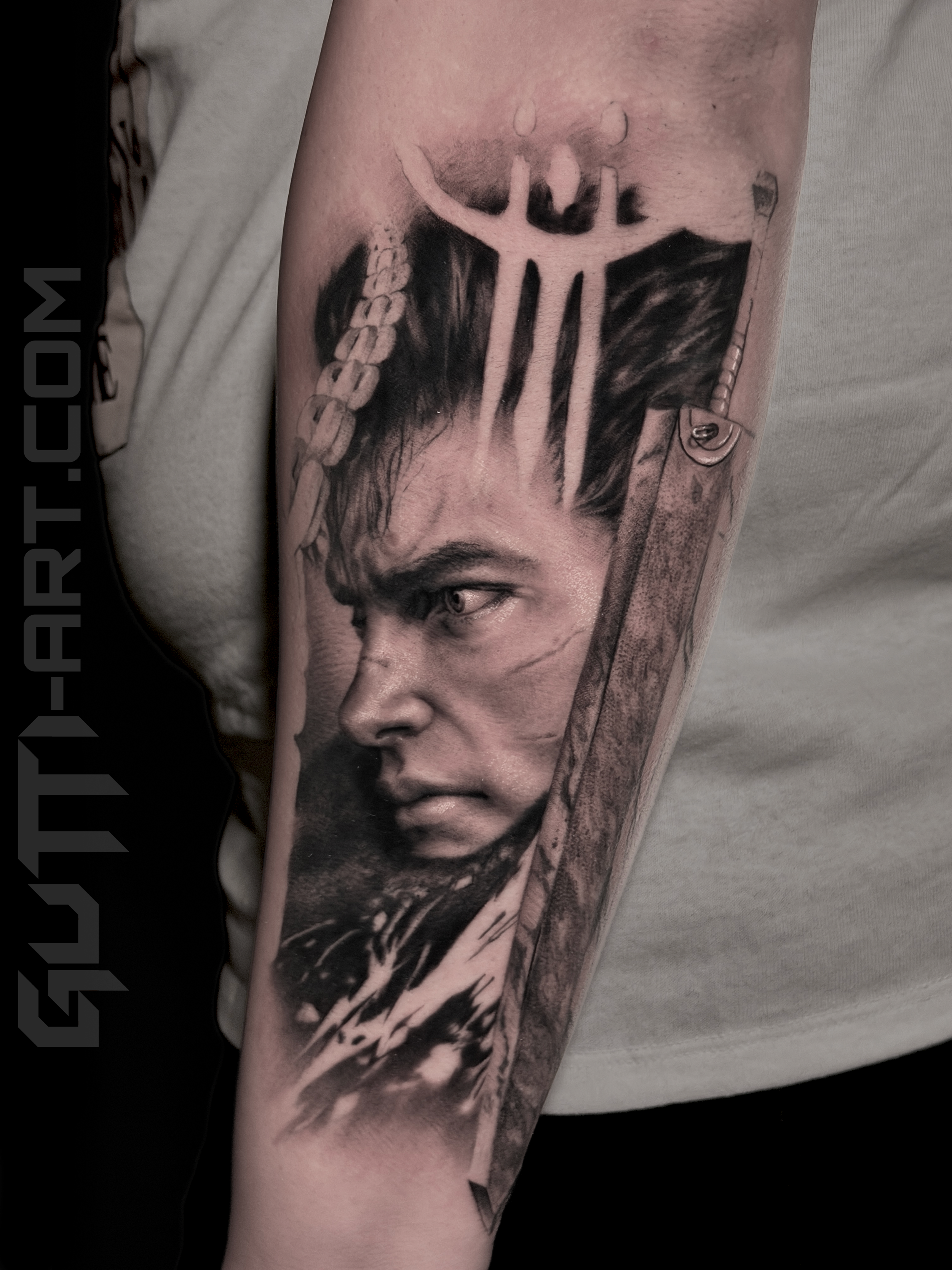 Innovative realistic black and grey tattoo Berserk anime, Guts Berserk with graphic design integration In Los Angeles Area, at Outer Limits tattoo shop. by Jhon Gutti