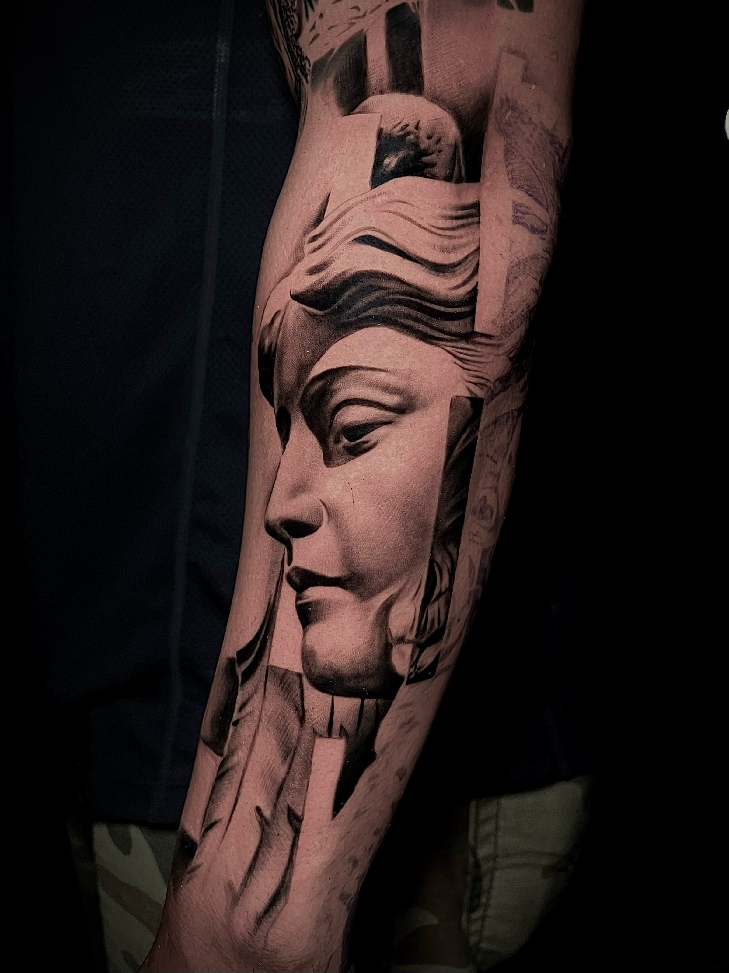 Innovative realistic black and grey tattoo modern angel with graphic design integration In Los Angeles Area, at Outer Limits tattoo shop. by Jhon Gutti