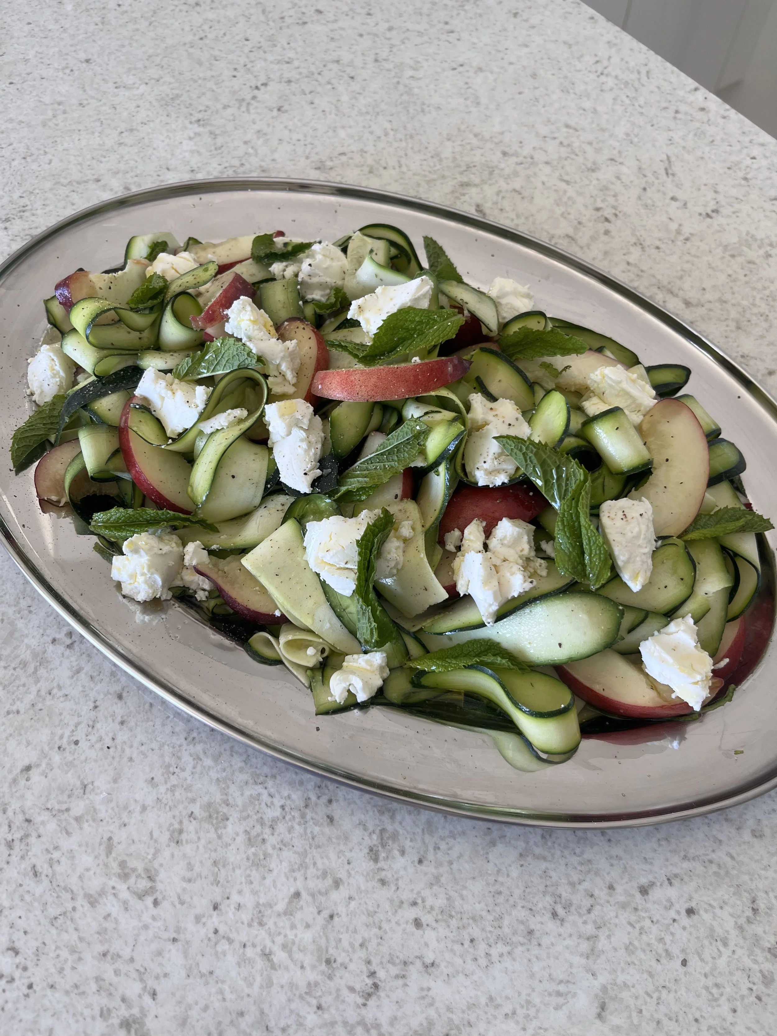 zucchini ribbons with peaches and goats cheese