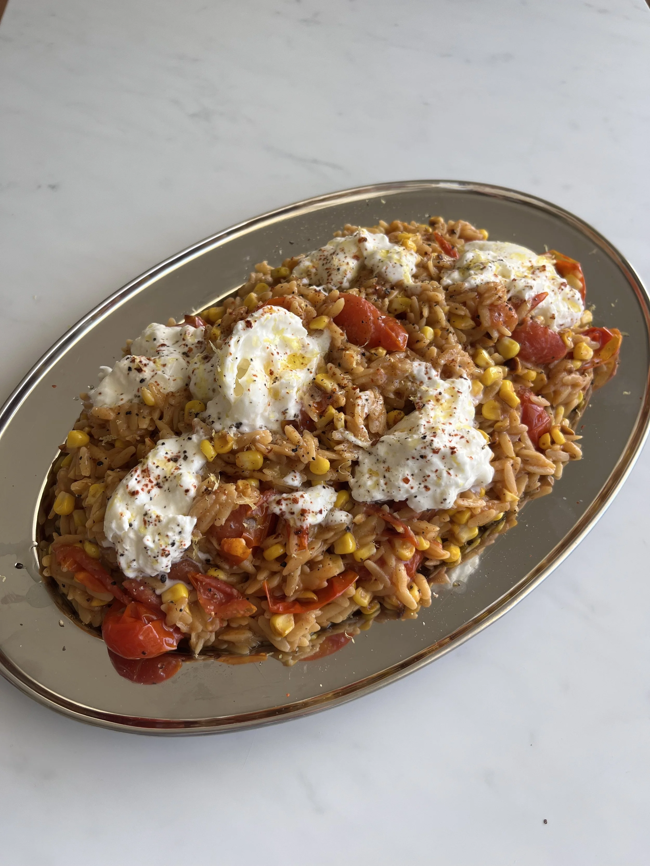 burst cherry tomato and corn orzo with burrata
