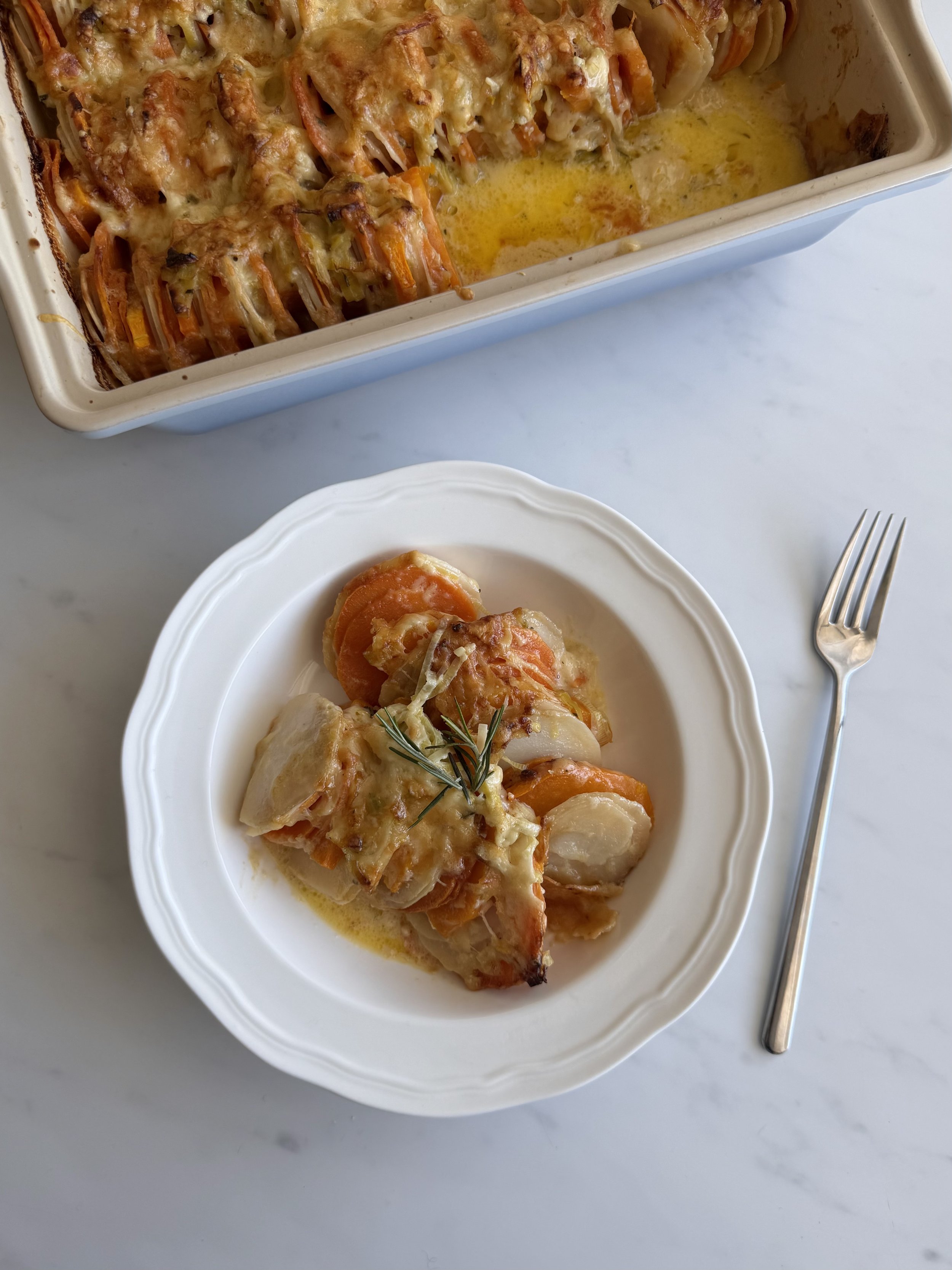 winter gratin with cheesy leek and rosemary cream