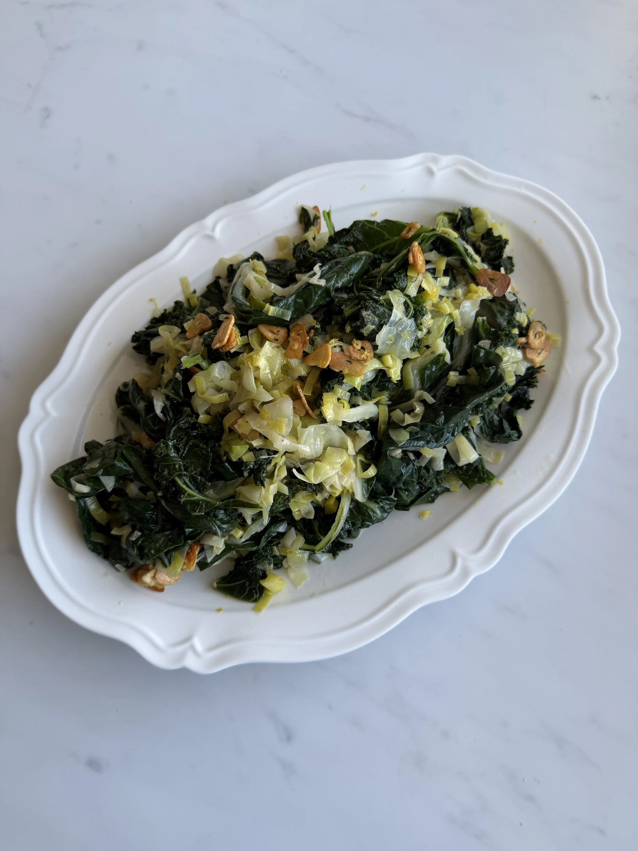 winter greens with anchovy butter and garlic crisp