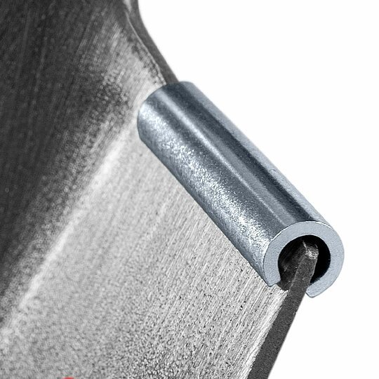 Close-up of Helko axe blade edge showing bevel and finish detail
