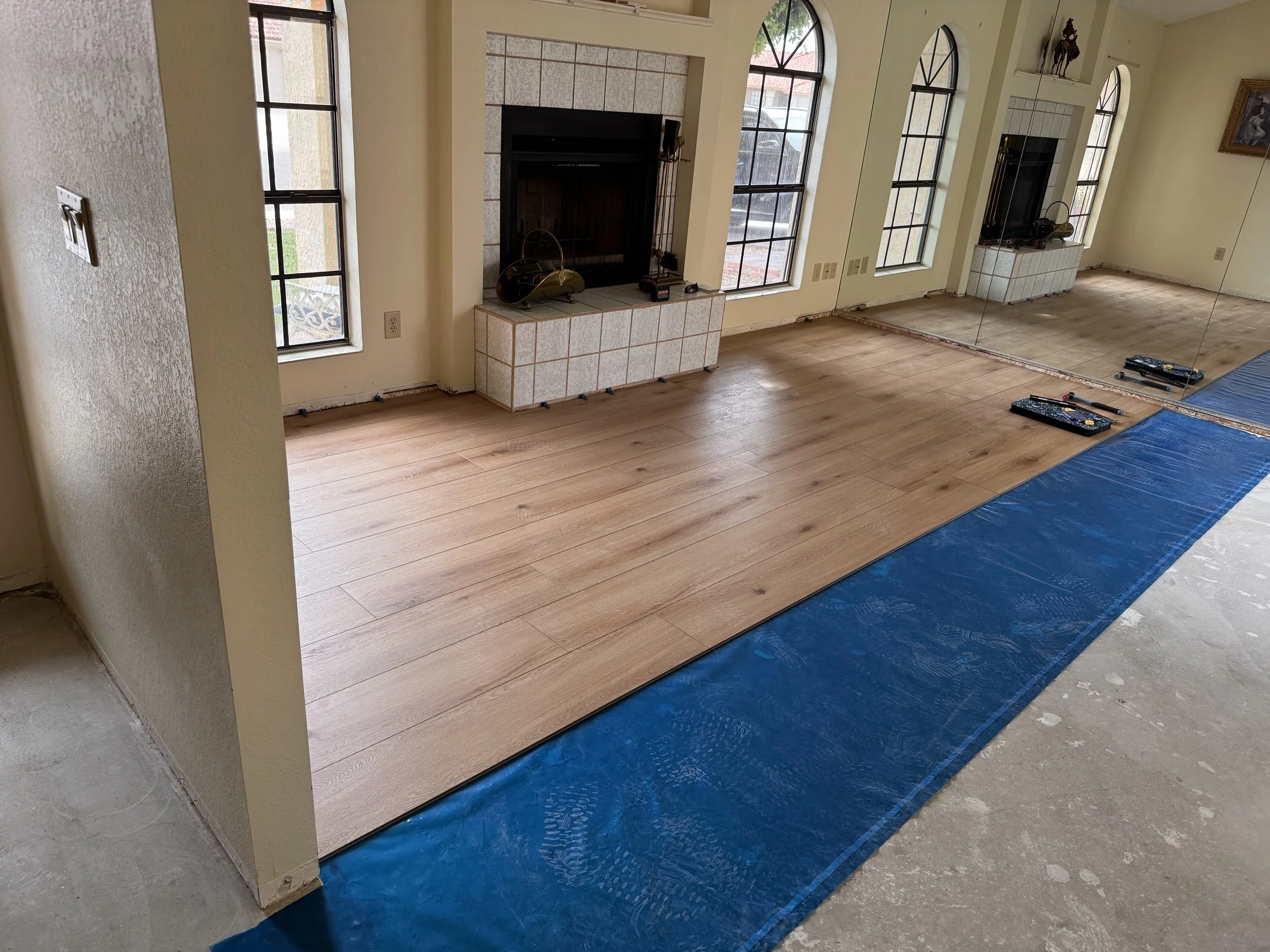 Luxury vinyl plank (LVP) installed in a living room.