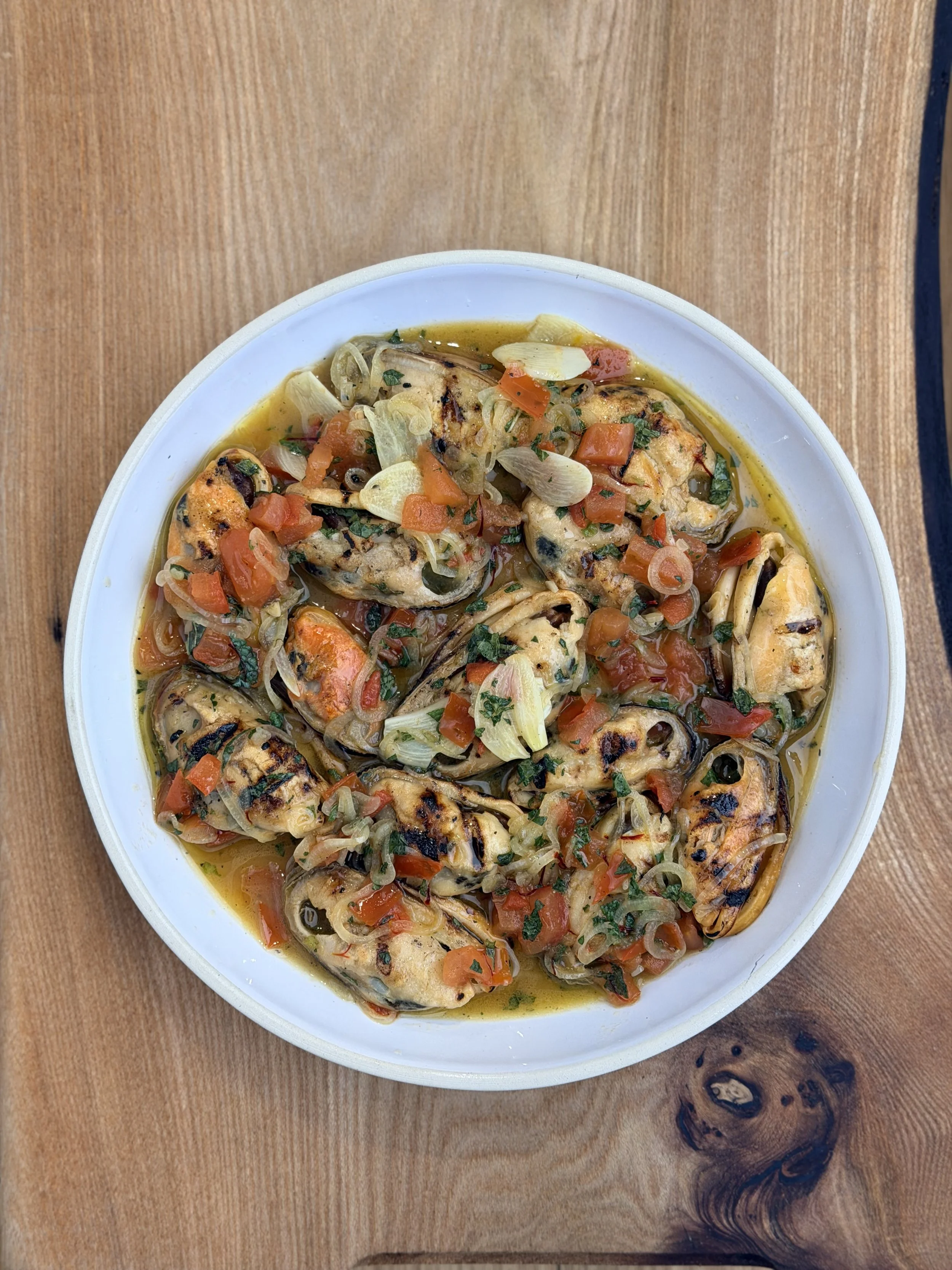 Smoked Green-Lipped Mussels with Tomato, Saffron and Mint