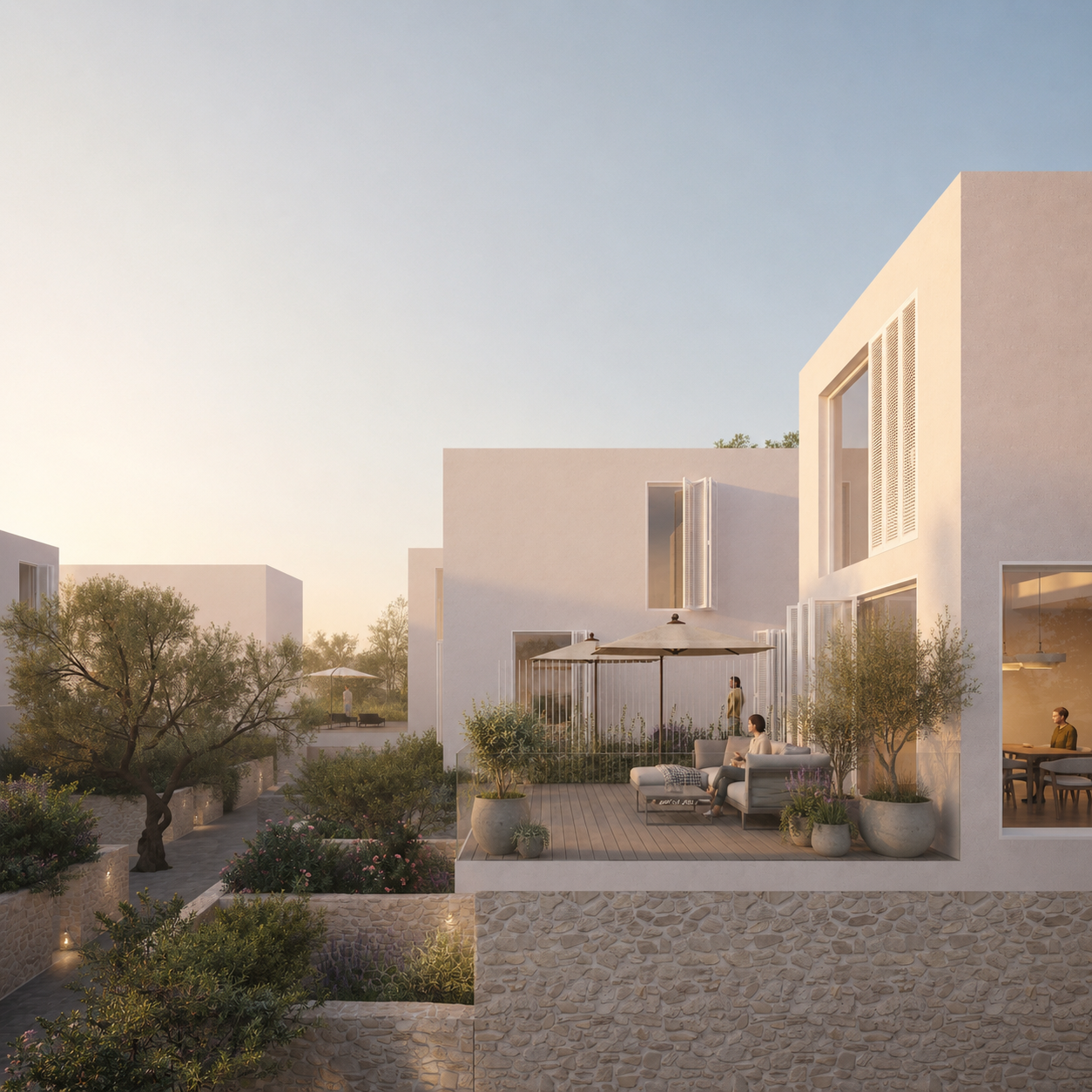 Modern white residential buildings with outdoor terrace and greenery, people relaxing on furniture, warm sunlight, clear sky.
