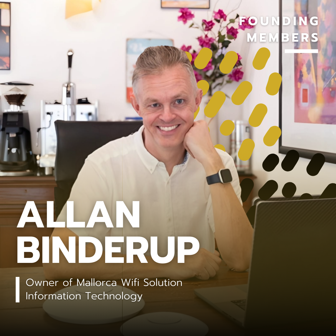 A smiling man named Allan Binderup sitting at a desk in an office. Behind him are decorative plants and framed artwork. There are coffee machines on a side counter. The image has overlay text indicating that Allan Binderup is the owner of Mallorca Wifi Solution and works in information technology.