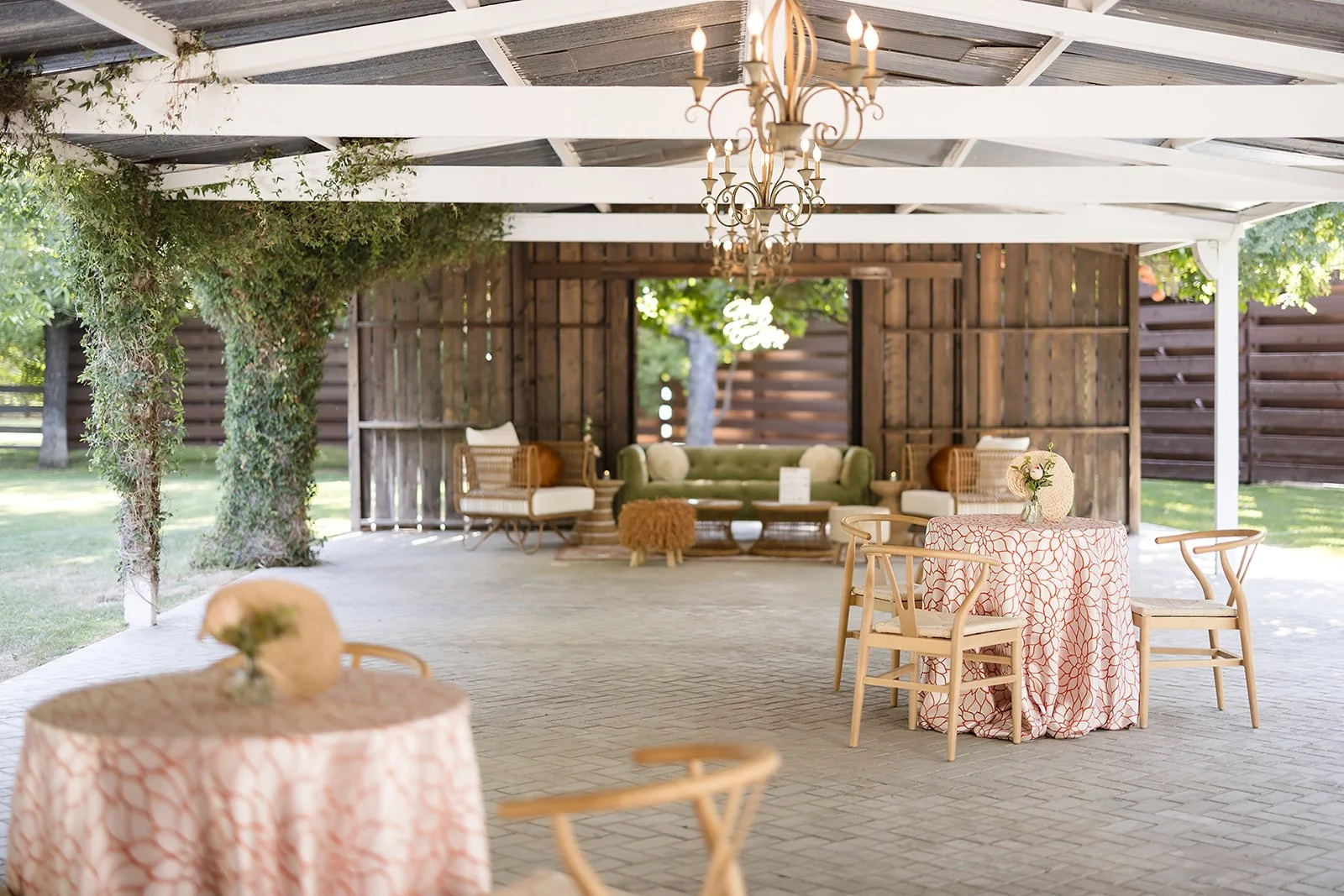 Wedding reception at Venue at the Grove decorated with colorful garden-inspired floral centerpieces.
