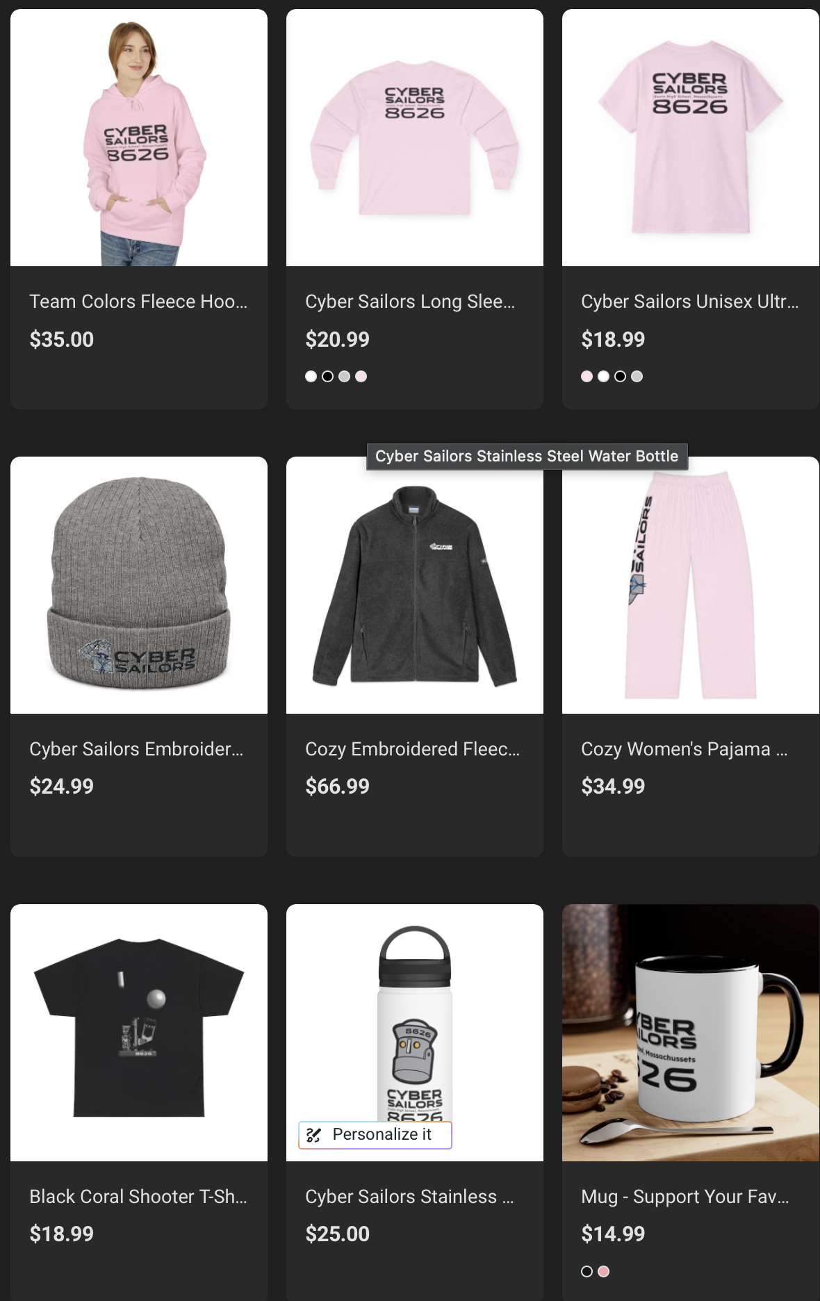 Collection of Cyber Sailors merchandise including a pink hoodie, long sleeve shirt, unisex T-shirt, embroidered cap, fleece jacket, women's pajama pants, black T-shirt, stainless steel water bottle, and a coffee mug, all featuring the Cyber Sailors logo and branding.