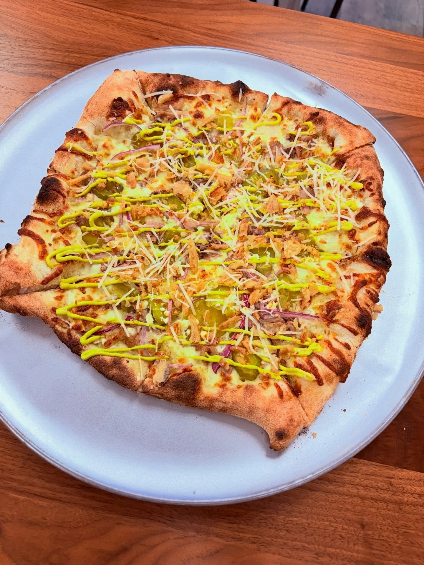 Playing around with some new specials for you guys&hellip; 

First up &mdash; The Cuban Pie 🇨🇺
Pulled pork, dill pickle chips, red onion &amp; a touch of Canadian goat cheese.
Finished with a dill pickle mustard drizzle, crispy onions &amp; parm.
S