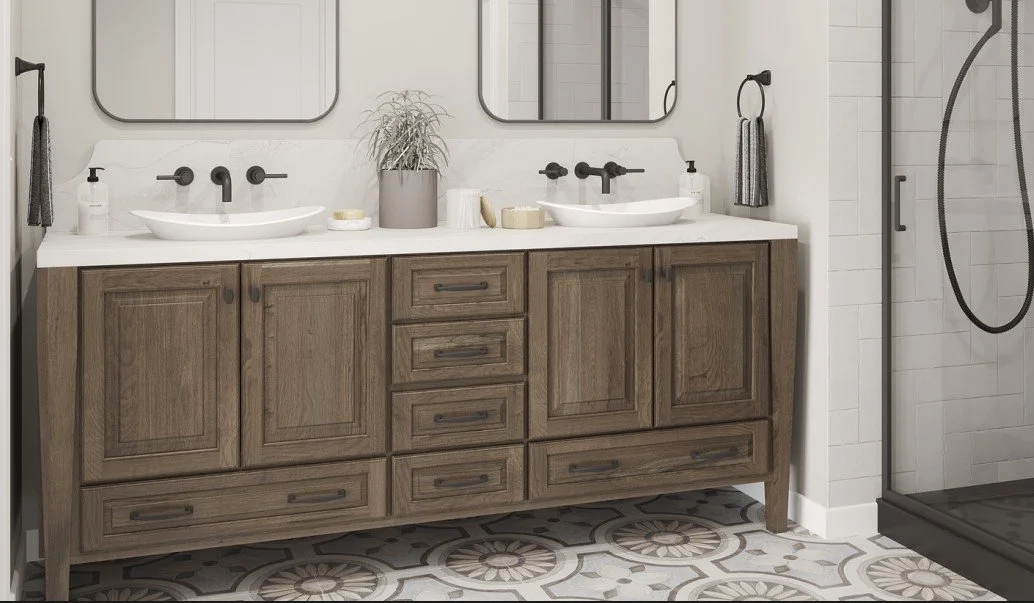 A bathroom with a wooden double vanity with two vessel sinks, black faucets, mirrors above, a plant in a pot, and a shower with a glass door on the right.