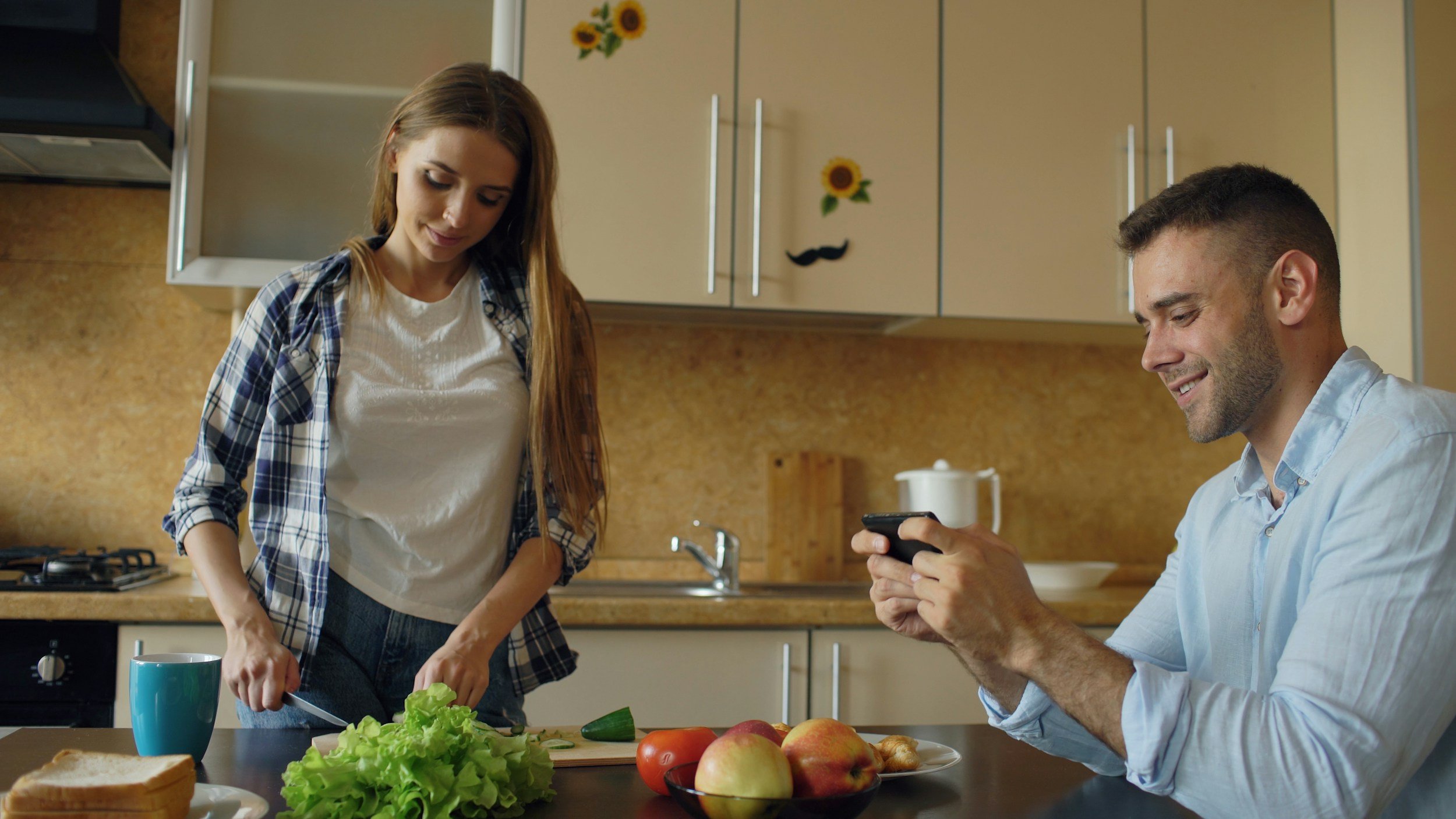 Happy woman preparing a healthy breakfast for energy and hormone balance