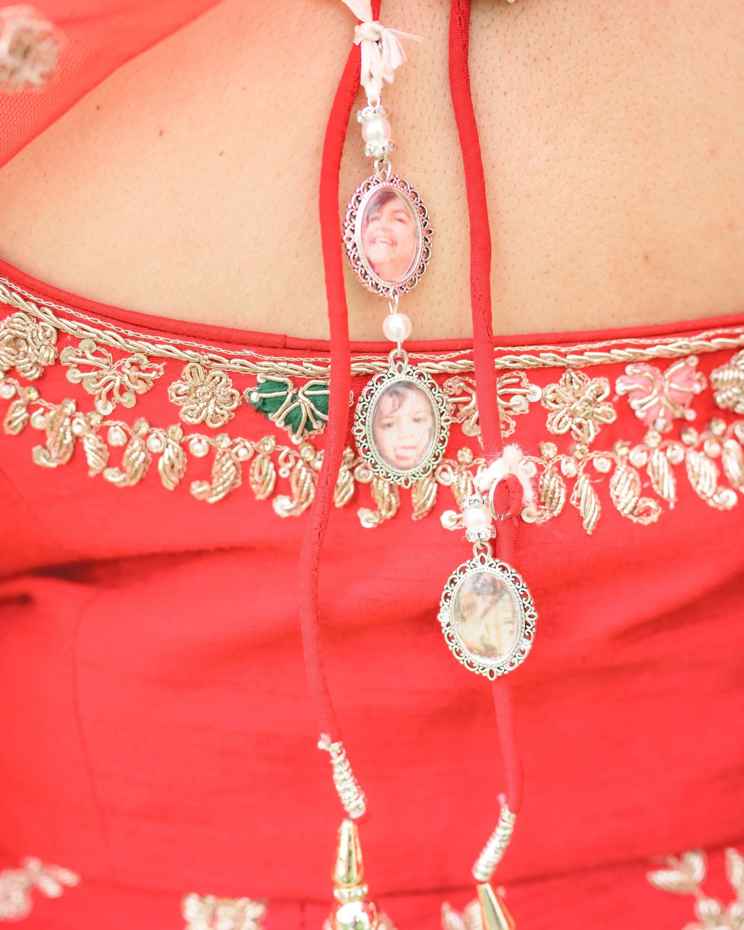 Tulsi's lockets on the back of her anarkali with photos