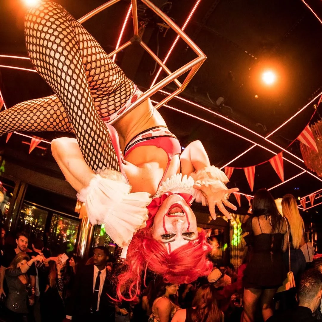 Crowd in costume enjoying music at PHD Halloween event