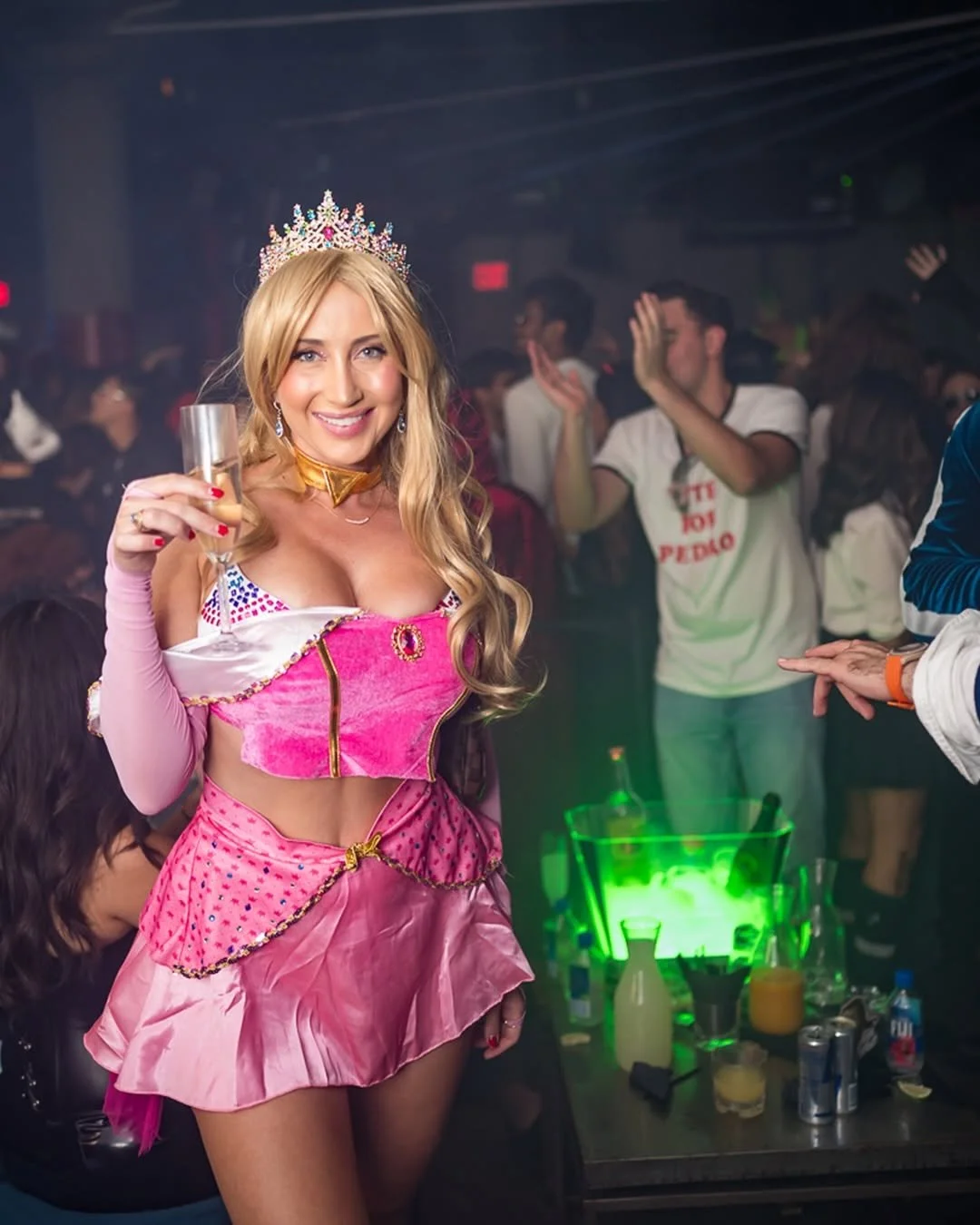 Halloween party crowd dancing at Slate NYC in full costume