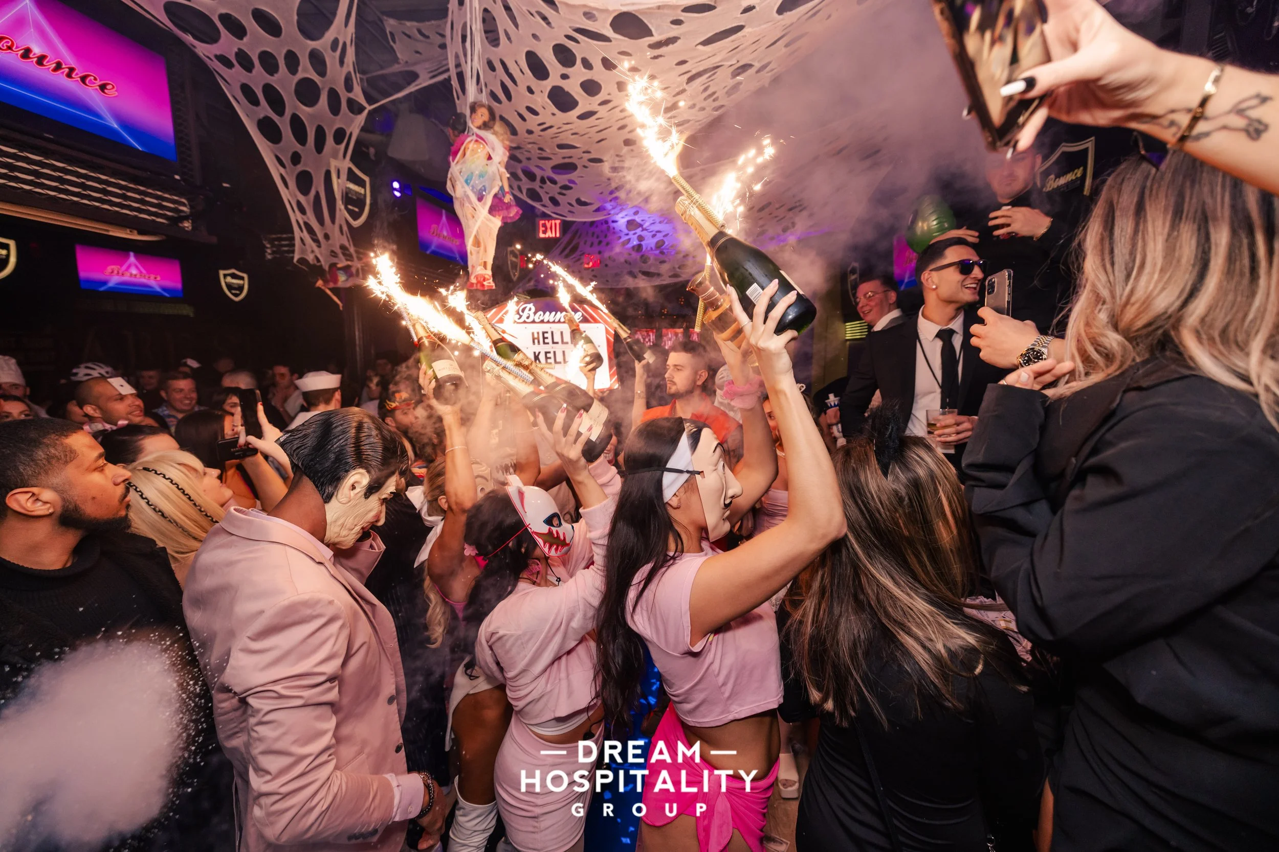 Midtown Manhattan crowd dressed in costumes for T-Squared Halloween party