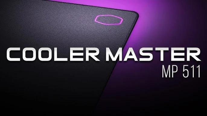 Close-up of Cooler Master MP 511 gaming mouse pad with purple lighting.