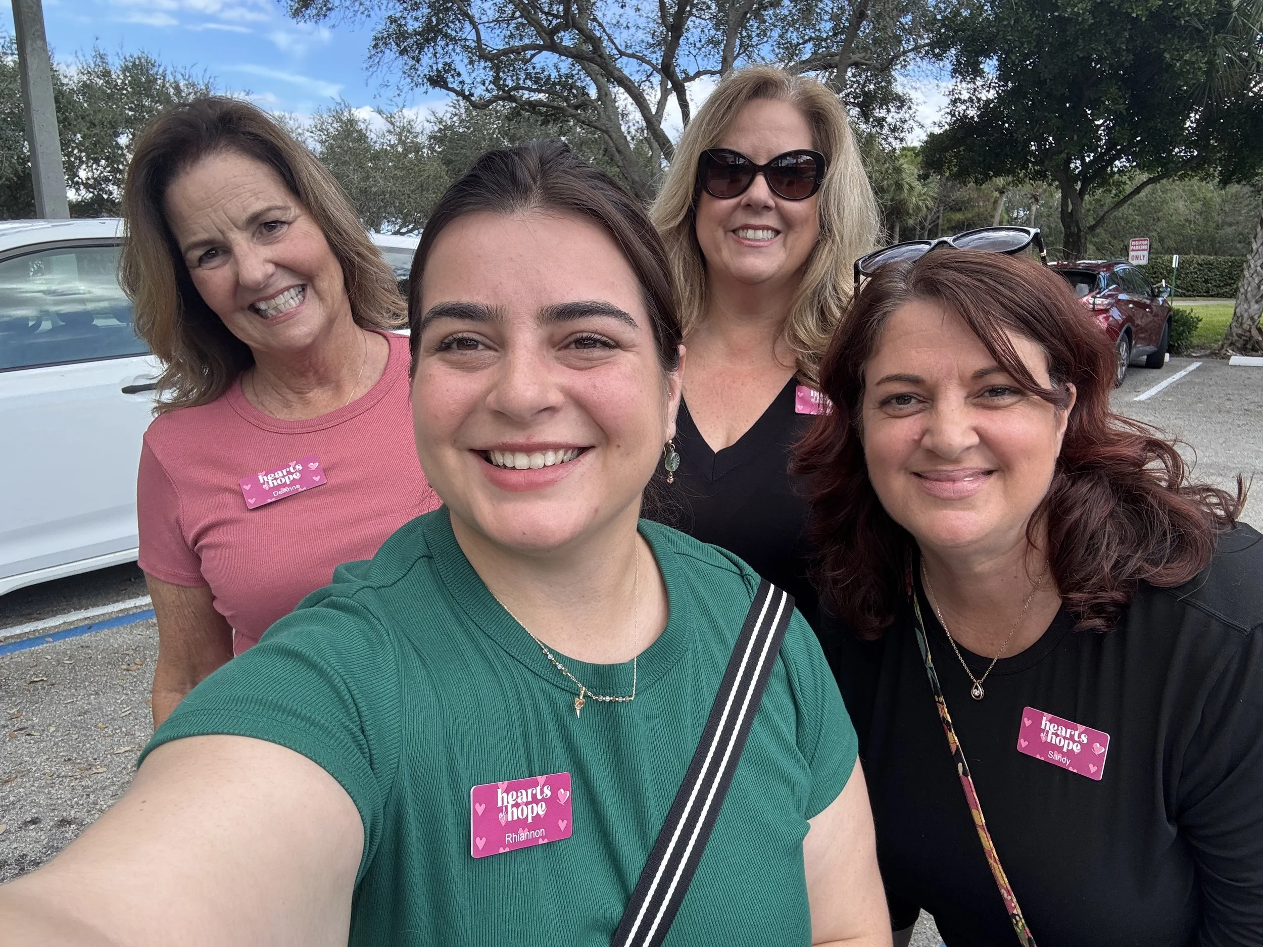 Picture of 3 women, volunteers at Hearts of Hope.