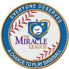 Circular logo with blue border and white background, featuring red baseball stitching around the edge. Inside, it says 'Everyone Deserves A Chance to Play Baseball' and includes a heart-shaped logo with a baseball, a star, and the text 'The Miracle League'.
