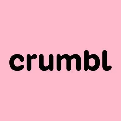 The word 'crumbl' in black letters on a pink background, with a spelling error for 'crumble'.