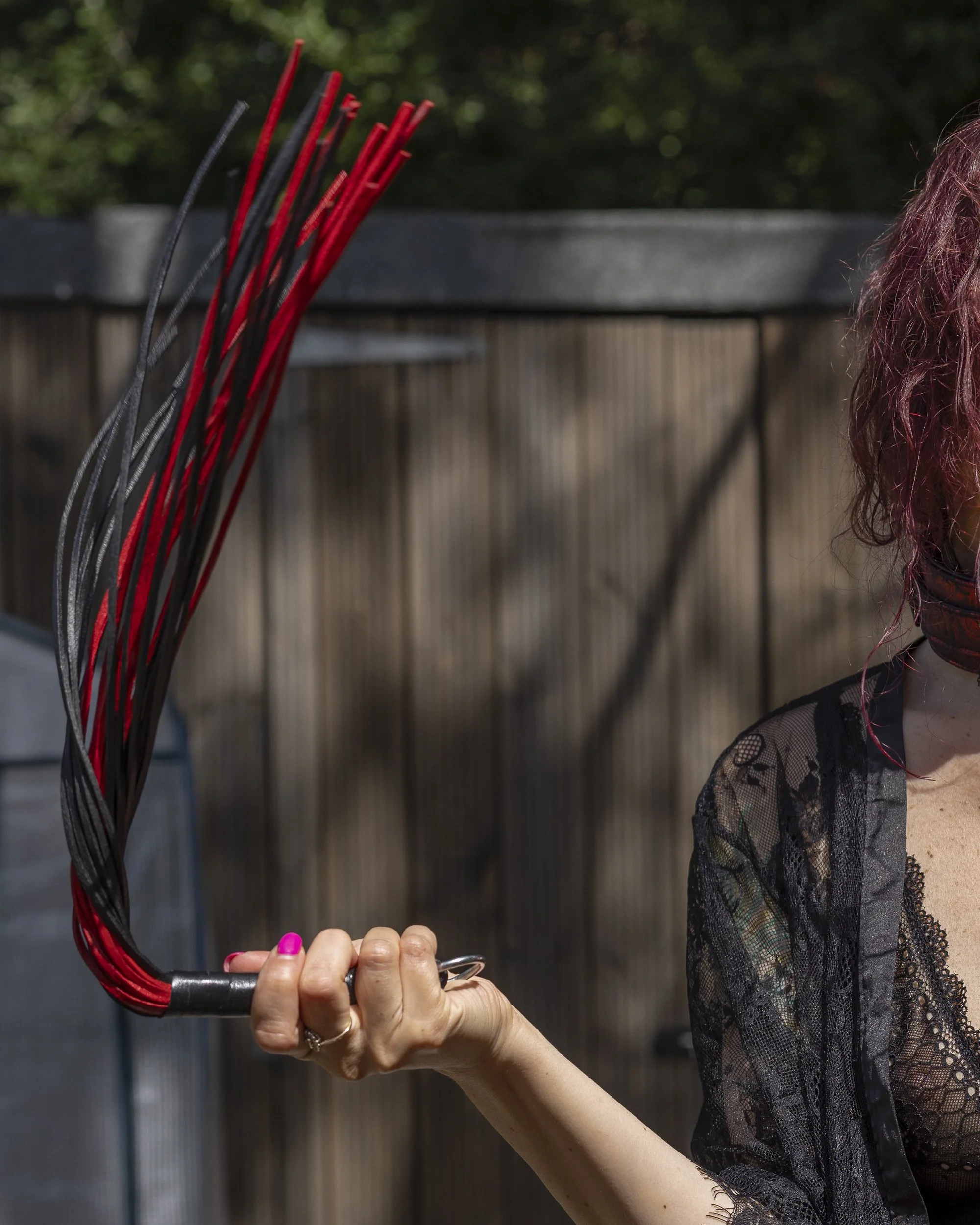 Monica waving flogger-1.jpg