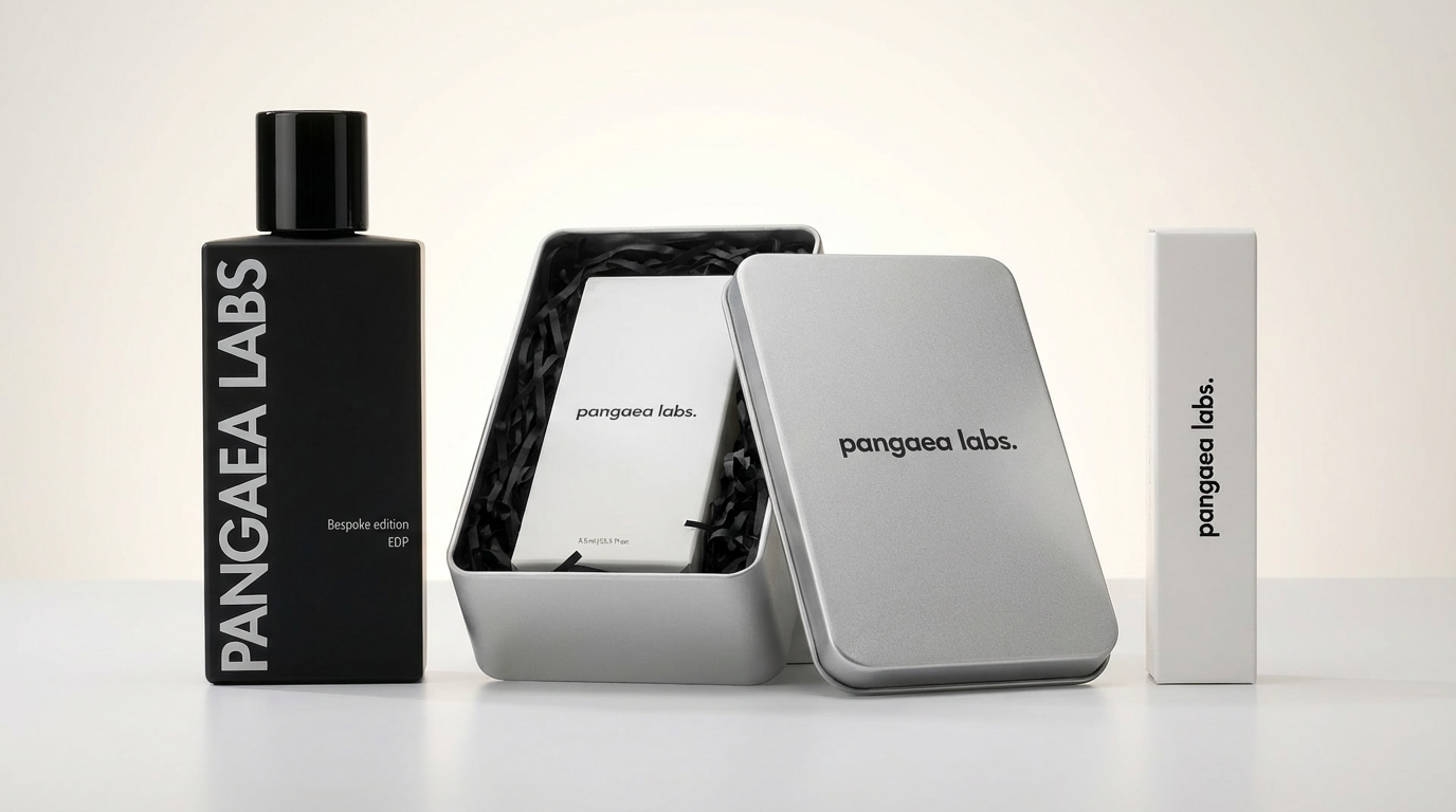 Product packaging for Pangaea Labs, including a black bottle labeled "PANGAEA LABS" and "Bespoke edition EDP," a white box with the same label inside a black container, and a rectangular white box with the brand name on it.
