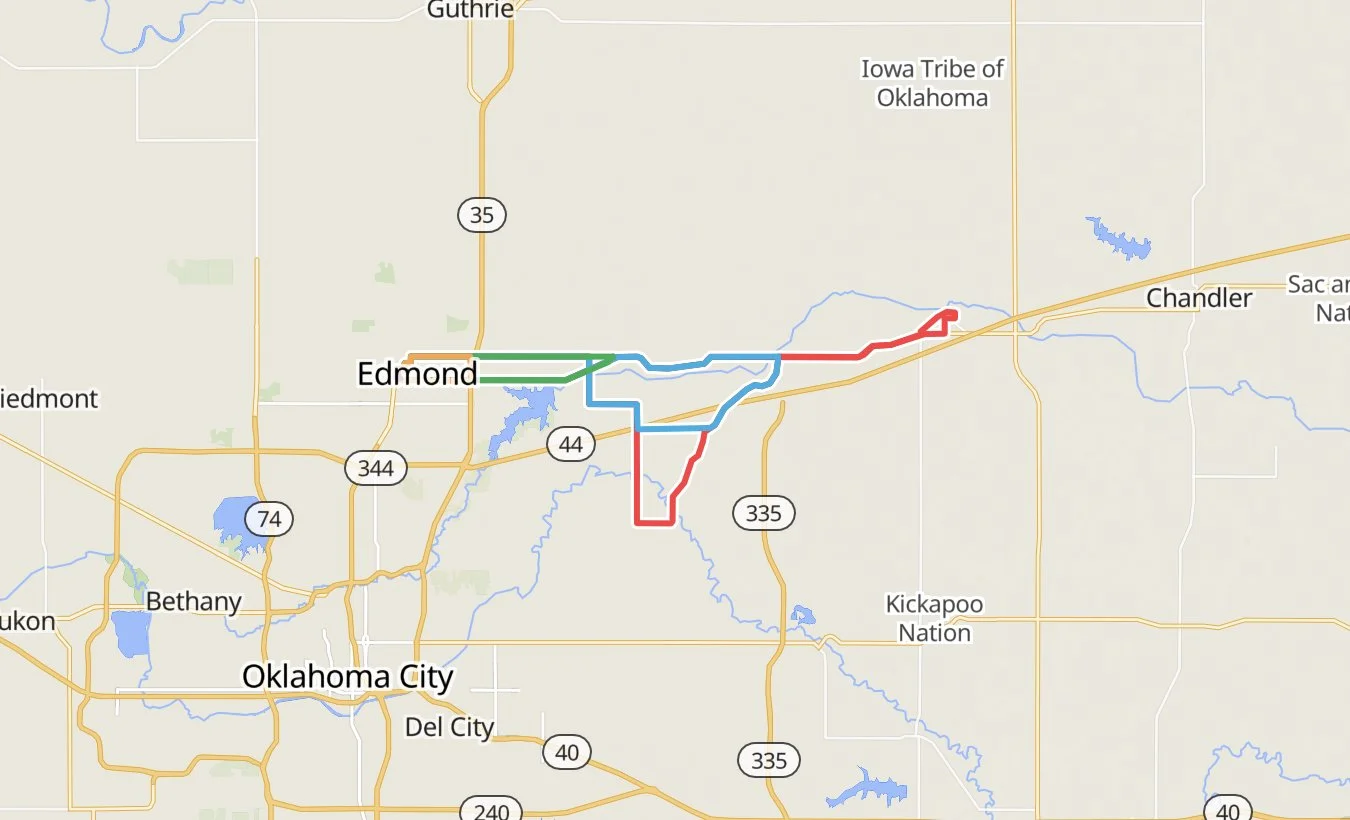 Map showing roads and routes around Edmond, Oklahoma, with colored lines indicating different paths, and nearby cities such as Oklahoma City and Chandler.